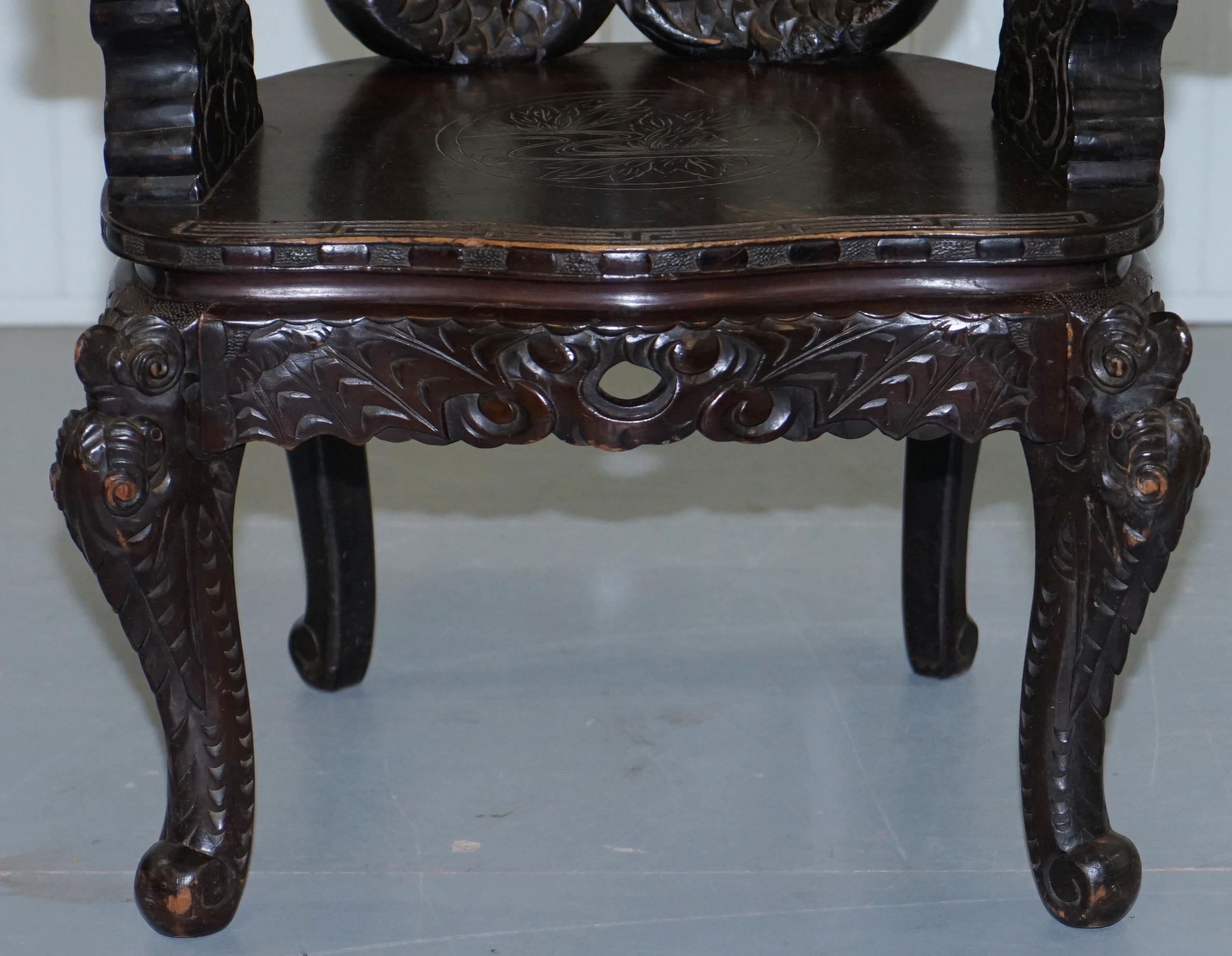 Pair of Black Qing Dynasty Carved Dragon and Lion Foo Dogs Armchairs, circa 1870 13