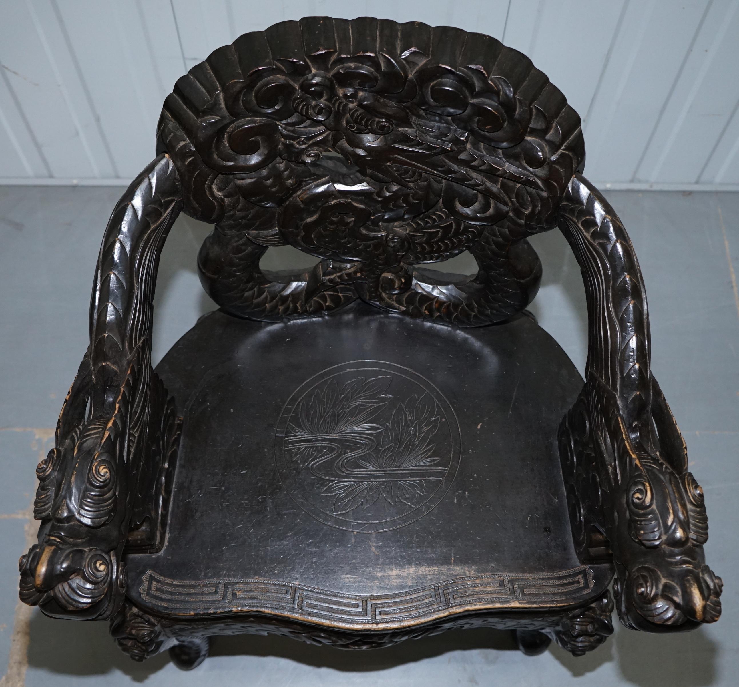 Pair of Black Qing Dynasty Carved Dragon and Lion Foo Dogs Armchairs, circa 1870 In Fair Condition In West Sussex, Pulborough