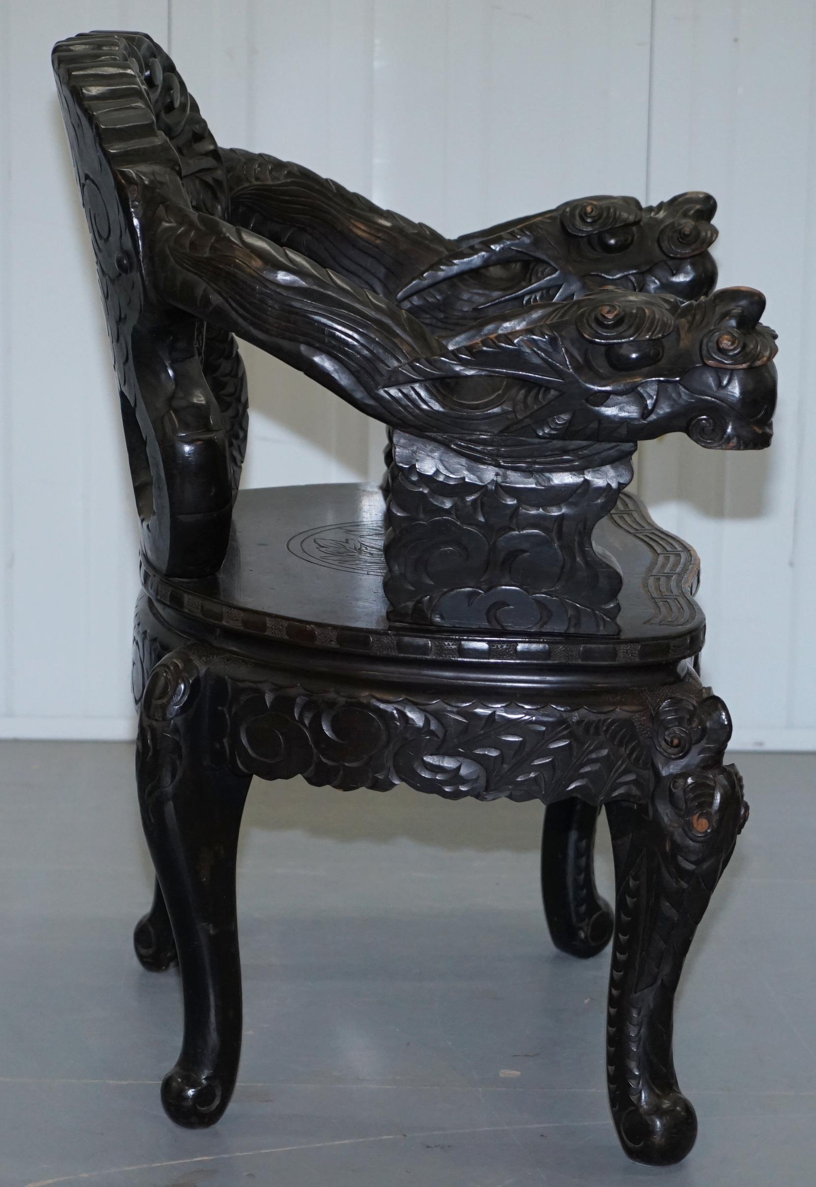 Pair of Black Qing Dynasty Carved Dragon and Lion Foo Dogs Armchairs, circa 1870 2