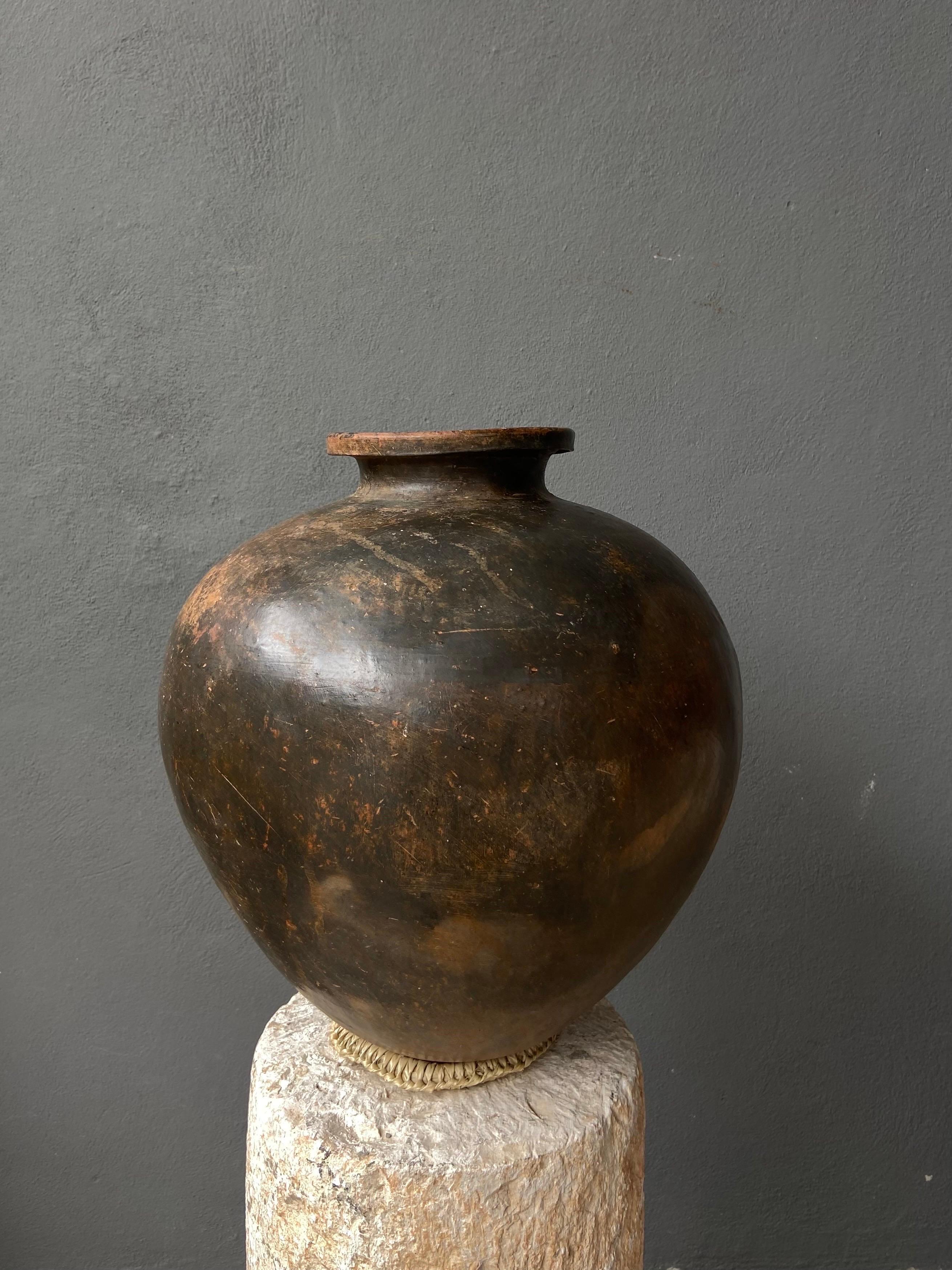 Pair of ceramic mezcal vessels from Central Oaxaca, circa 1950´s. Both have a nice hue or pigmentation of iron oxide from the earth and mud where they once lay. The vessels were used to transport mezcal by way of donkey from one village to the