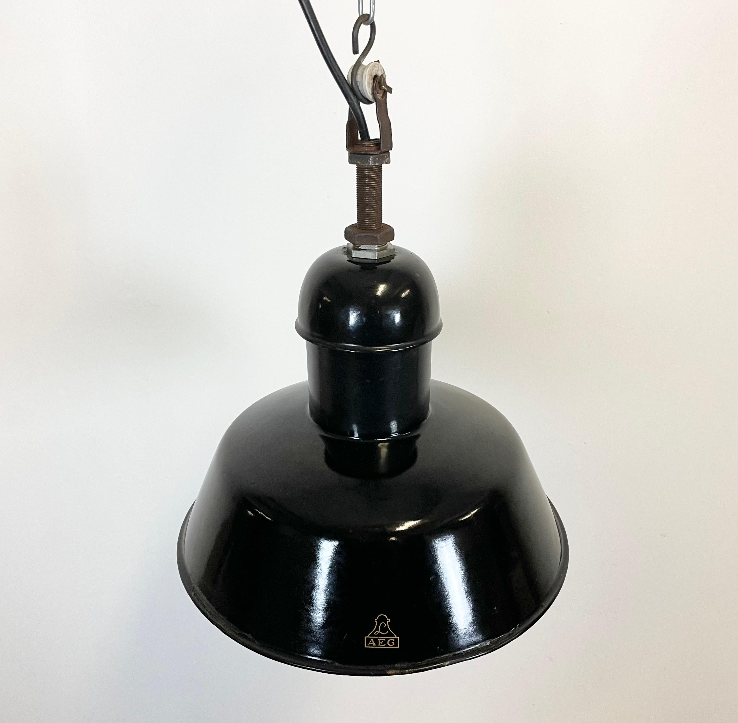 Pair of Black Enamel Industrial Pendant Lamps from AEG, 1930s 8