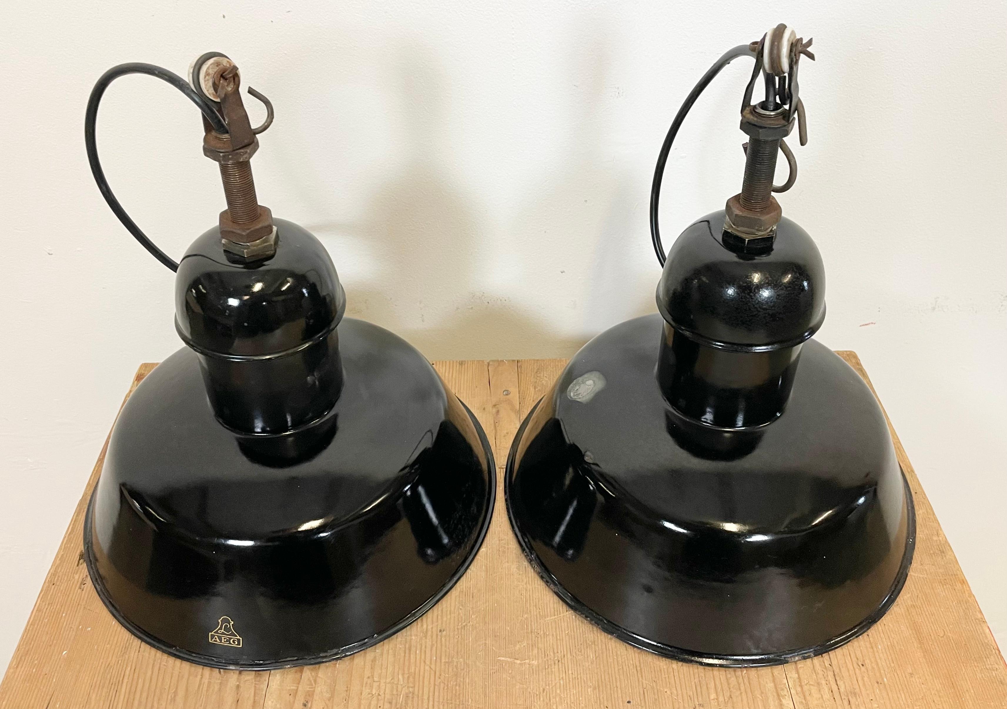 German Pair of Black Enamel Industrial Pendant Lamps from AEG, 1930s