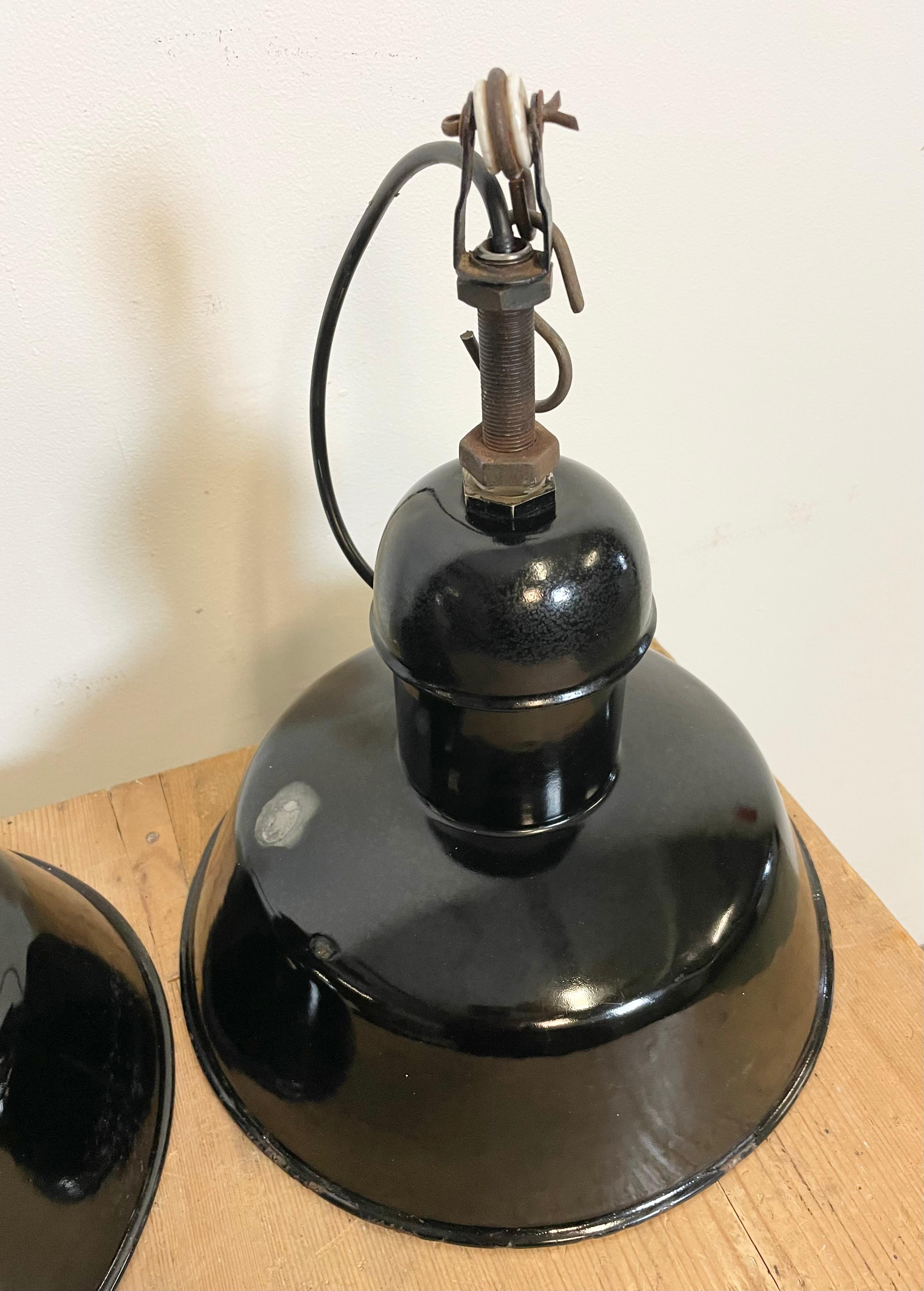 Mid-20th Century Pair of Black Enamel Industrial Pendant Lamps from AEG, 1930s