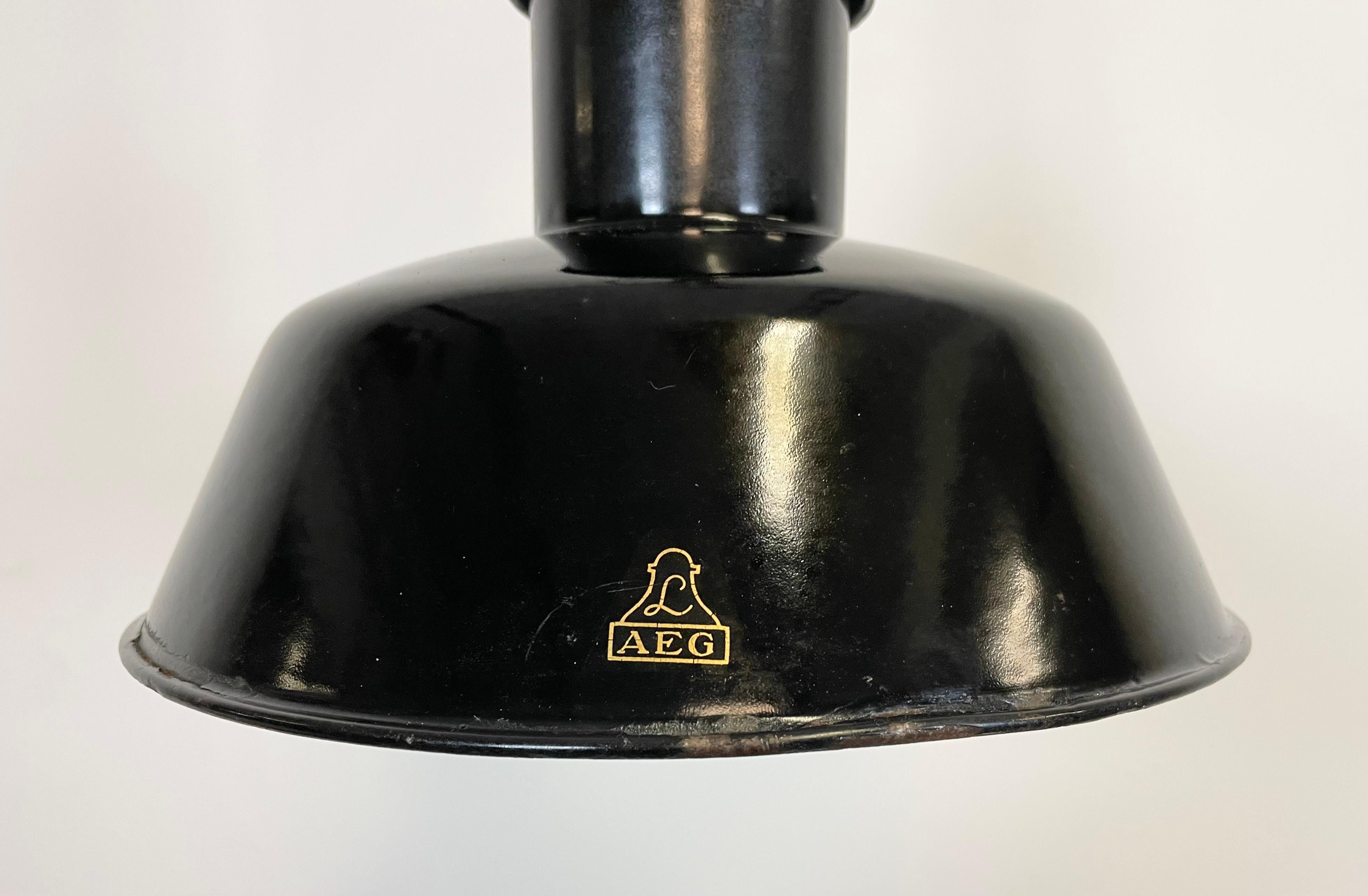 Pair of Black Enamel Industrial Pendant Lamps from AEG, 1930s 4