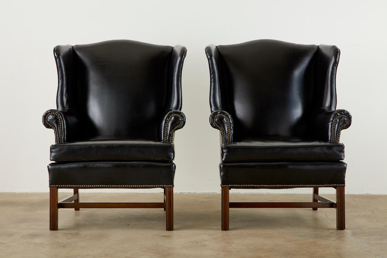 American Pair of Black English Georgian Style Mahogany Wingbacks