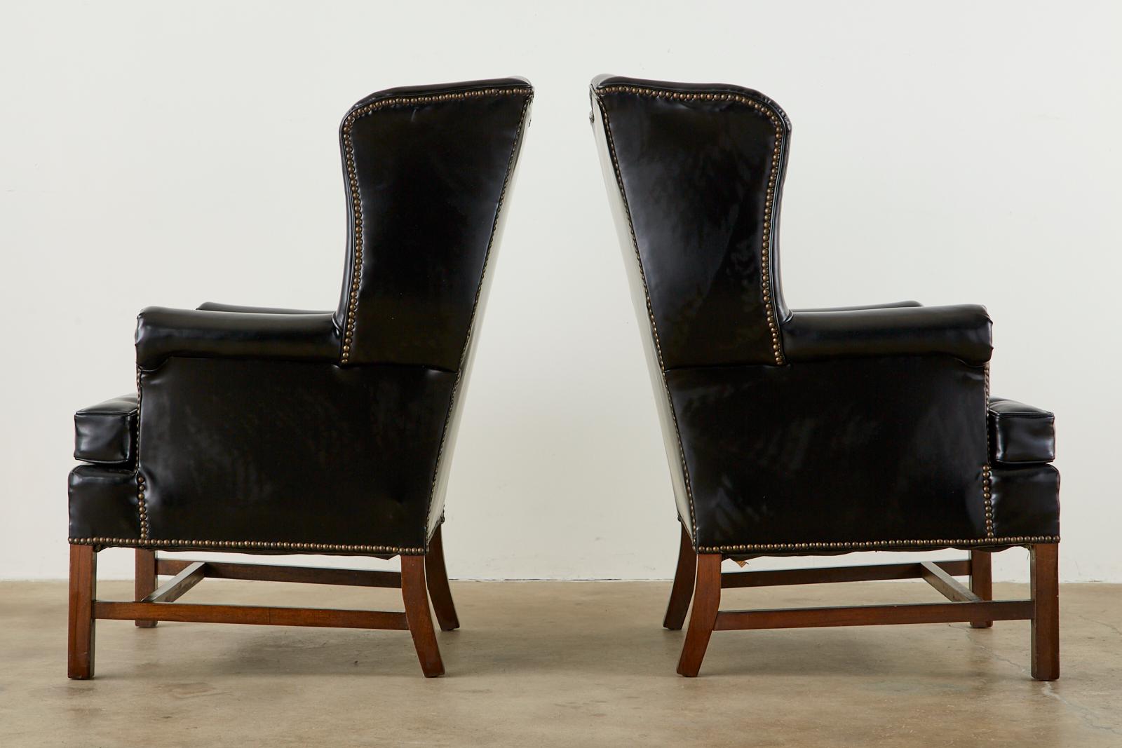 Hand-Crafted Pair of Black English Georgian Style Mahogany Wingbacks