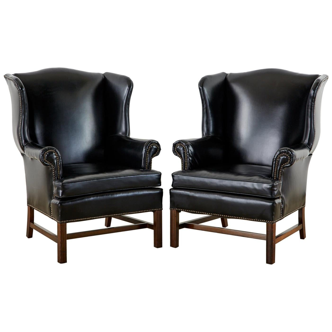 Pair of Black English Georgian Style Mahogany Wingbacks