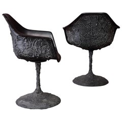 Pair of Black Fiberglass Swivel Chairs