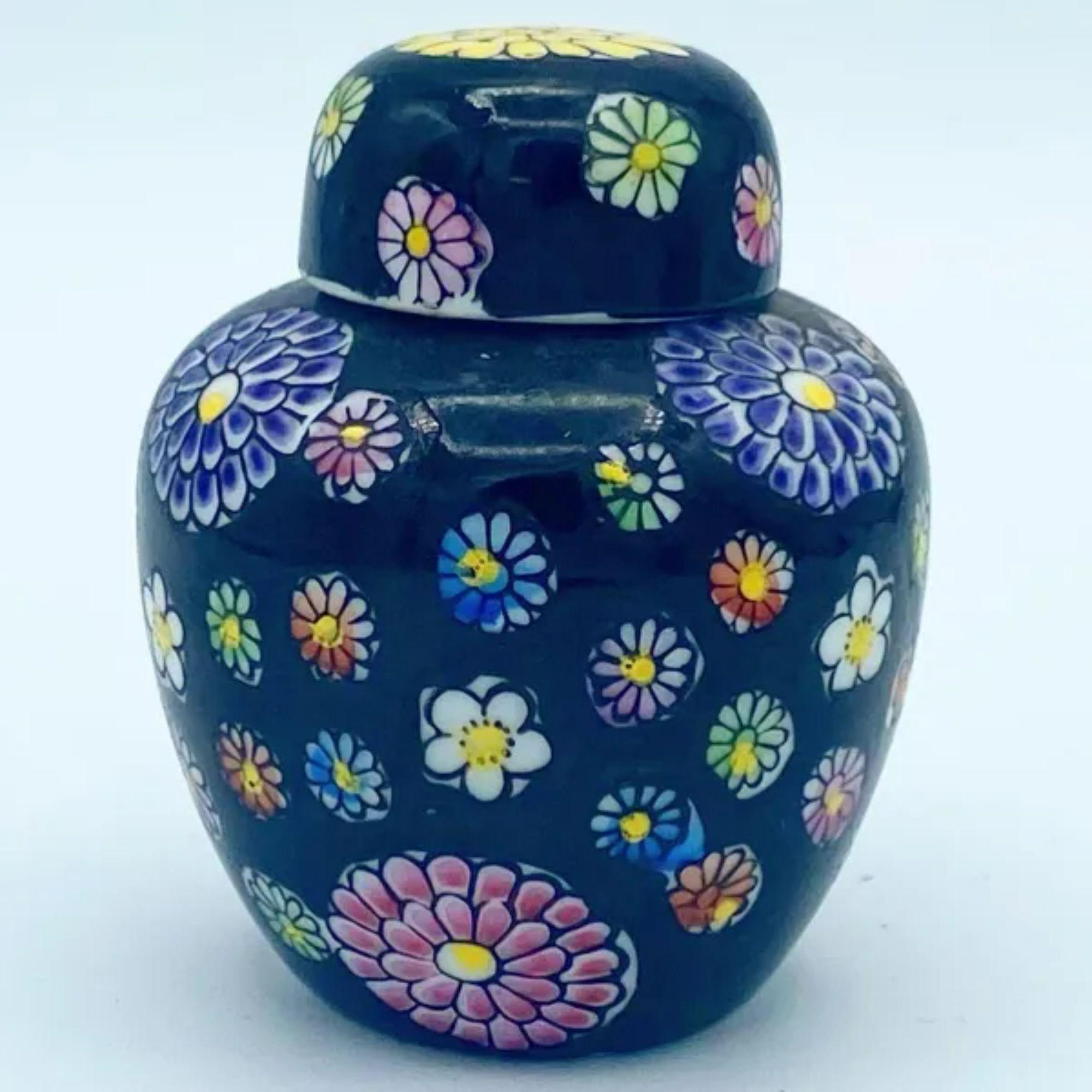 Only one of the jars has a lid.

Additional information: 
Material: Porcelain
Color: Black
Style: Asian Antique, Vintage
Time Period: 1970s
Place of origin: Japan
Dimension: 2.25” L x 2.25” D x 3” H