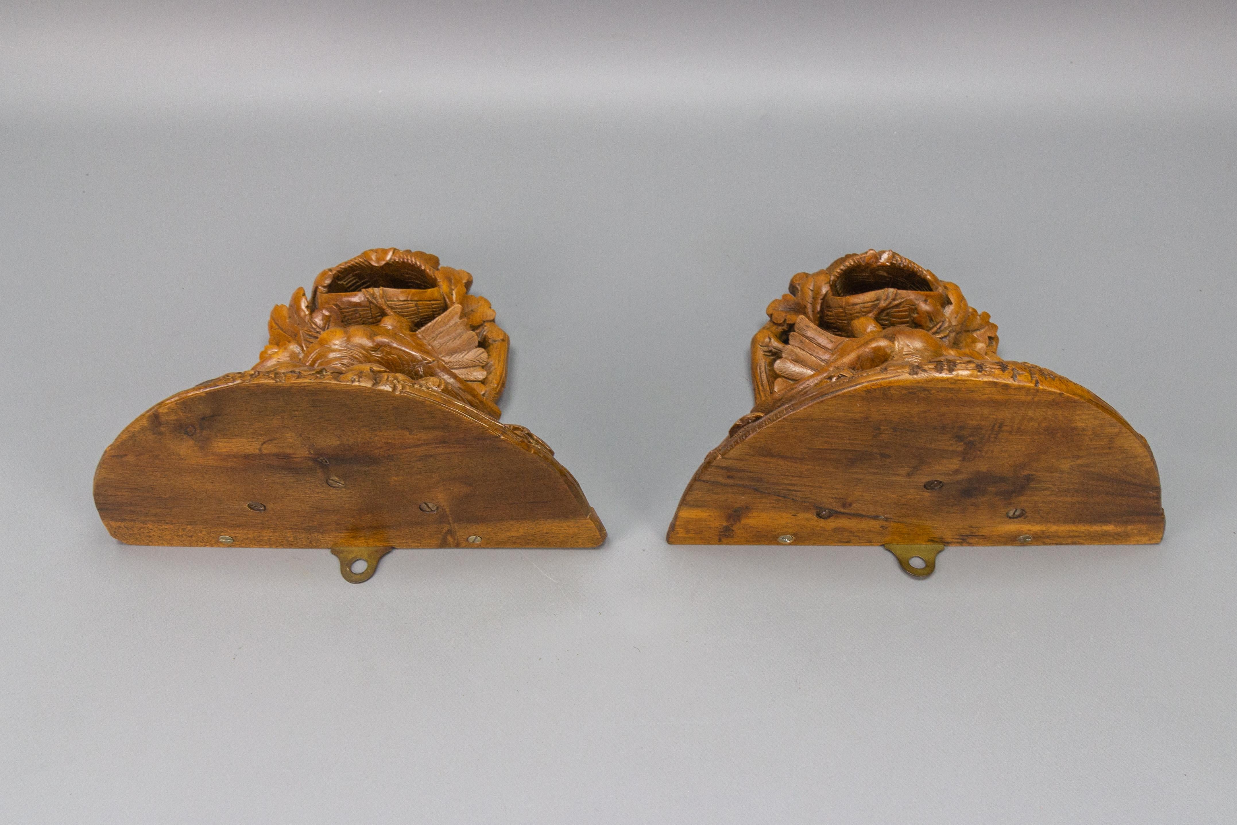 Pair of Black Forest Carved Walnut Bird Nest Wall-Mounted Consoles, ca. 1920 For Sale 1