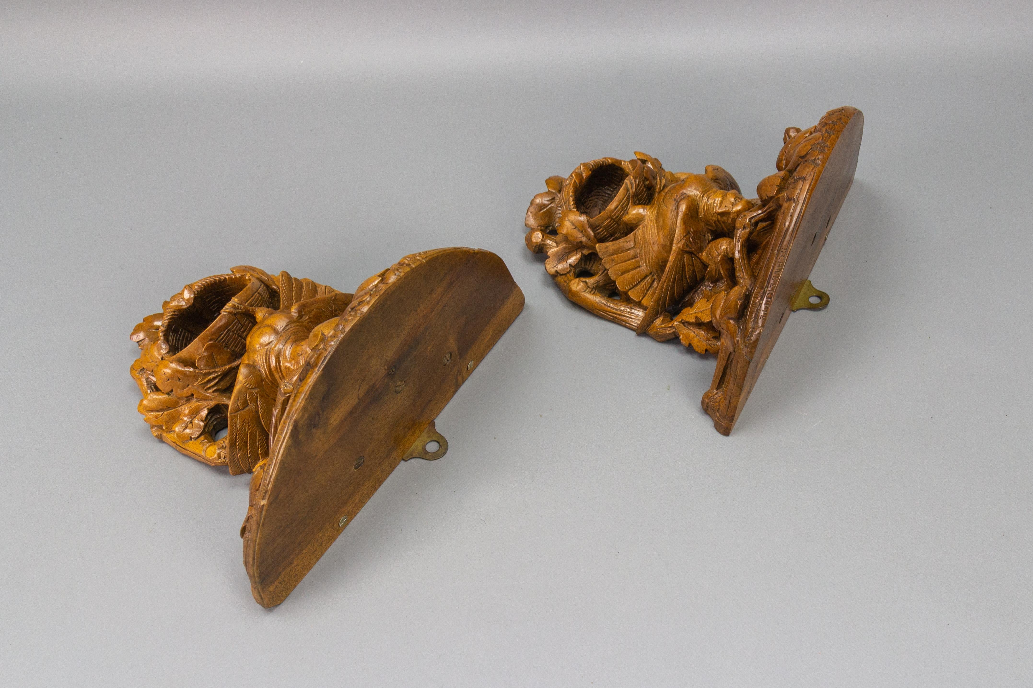 Pair of Black Forest Carved Walnut Bird Nest Wall-Mounted Consoles, ca. 1920 For Sale 2
