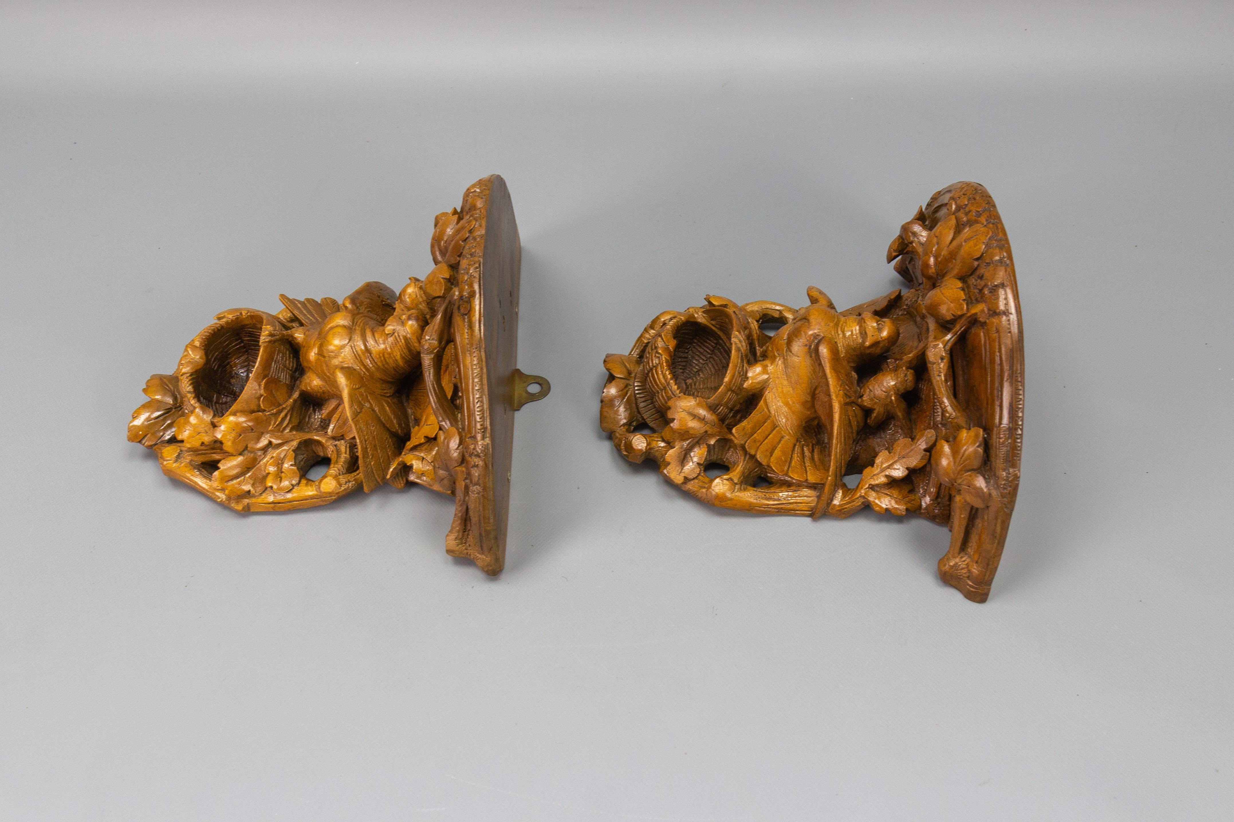 Pair of Black Forest Carved Walnut Bird Nest Wall-Mounted Consoles, ca. 1920 For Sale 3