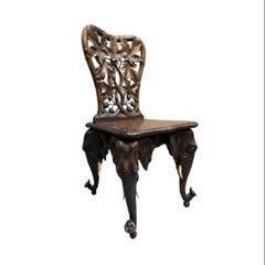 Pair of Black Forest Linden Wood Swiss Maharajah Chairs Circa 1890