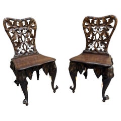 Pair of Black Forest Linden Wood Swiss Maharajah Chairs Circa 1890