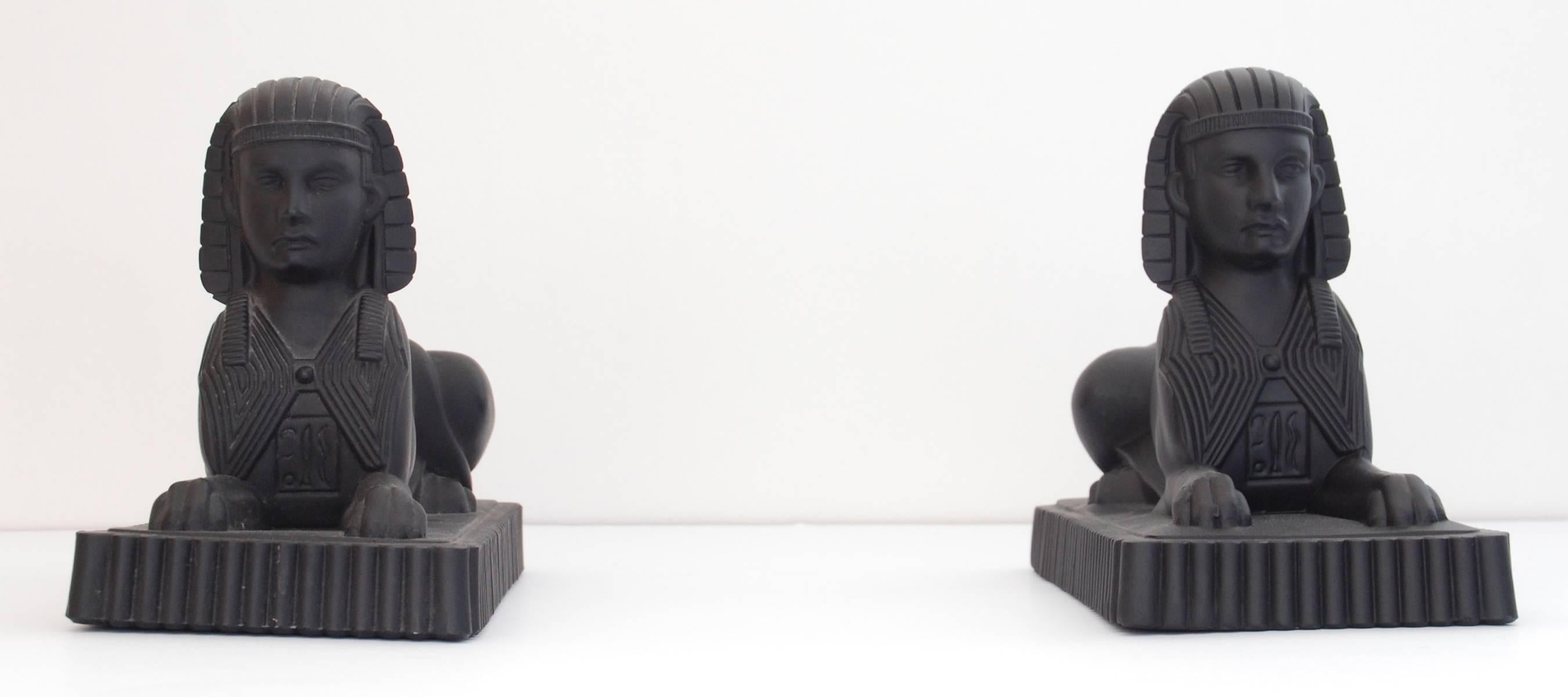 A pair of sphinxes in black glass. Little is known of this Manchester glassworks, but they had a very successful line in neoclassical pieces of which these are a fine example.
 