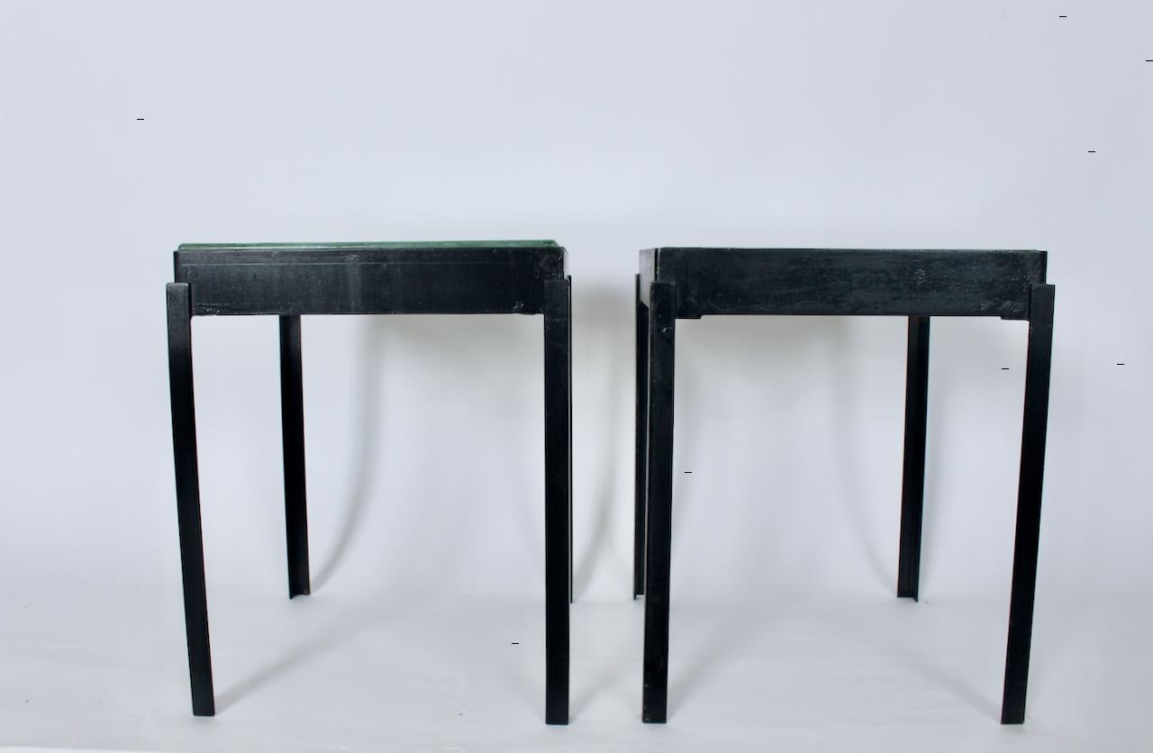 Pair of square Black Angle Iron and Inset Glass Brick Coffee Tables, C. 1980. Display Tables. Plant Stands. Featuring a sturdy square Black enameled angle Iron open framework, inset with separate, lipped, smooth edge, clear architectural flat top