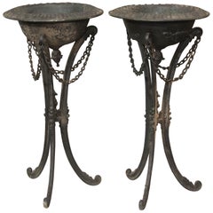 Pair of Black Iron Standing Urns or Planters