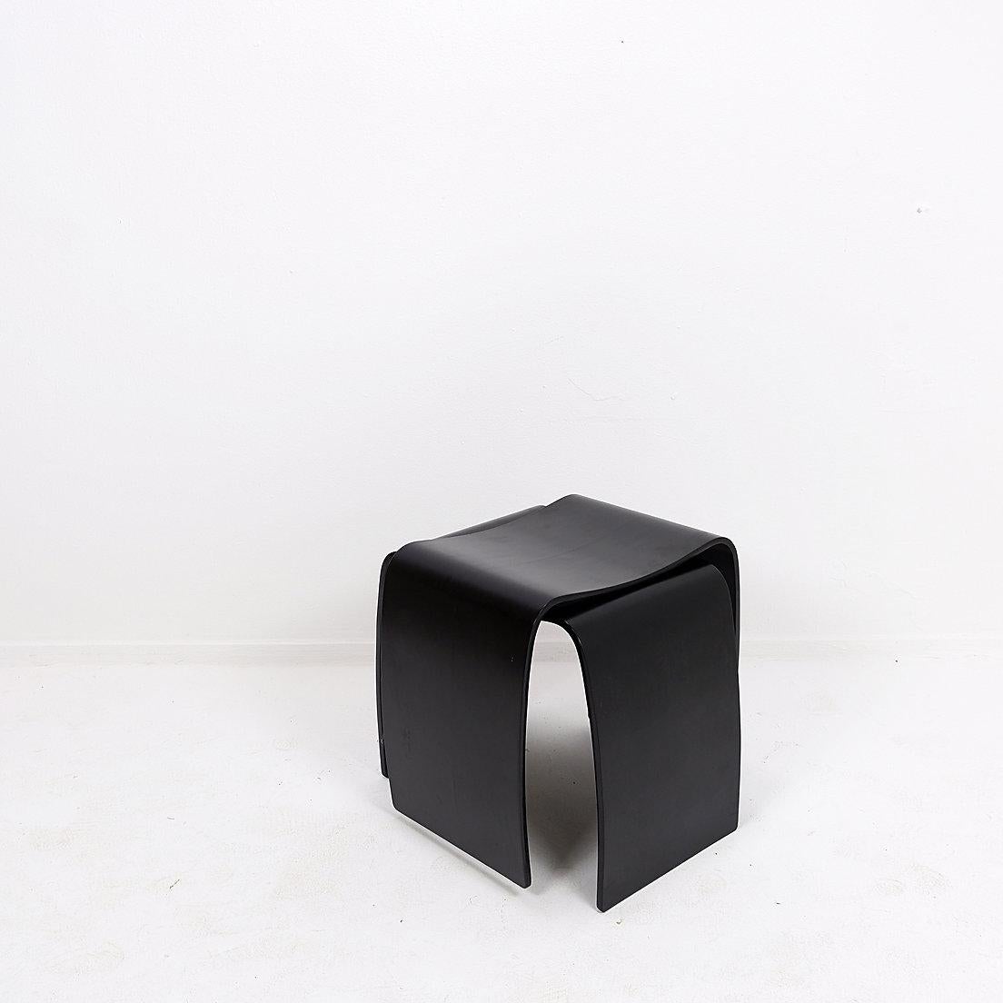 Pair of black Jørgen Møller M-Stools - Circa early-21st century, 2000s
Contemporary modern Minimalist - Danish desingner
Stools can be stacked on top of one another for storage purposes if so desired.
Measures : 50cmx31cm H:41,5cm 
Material :