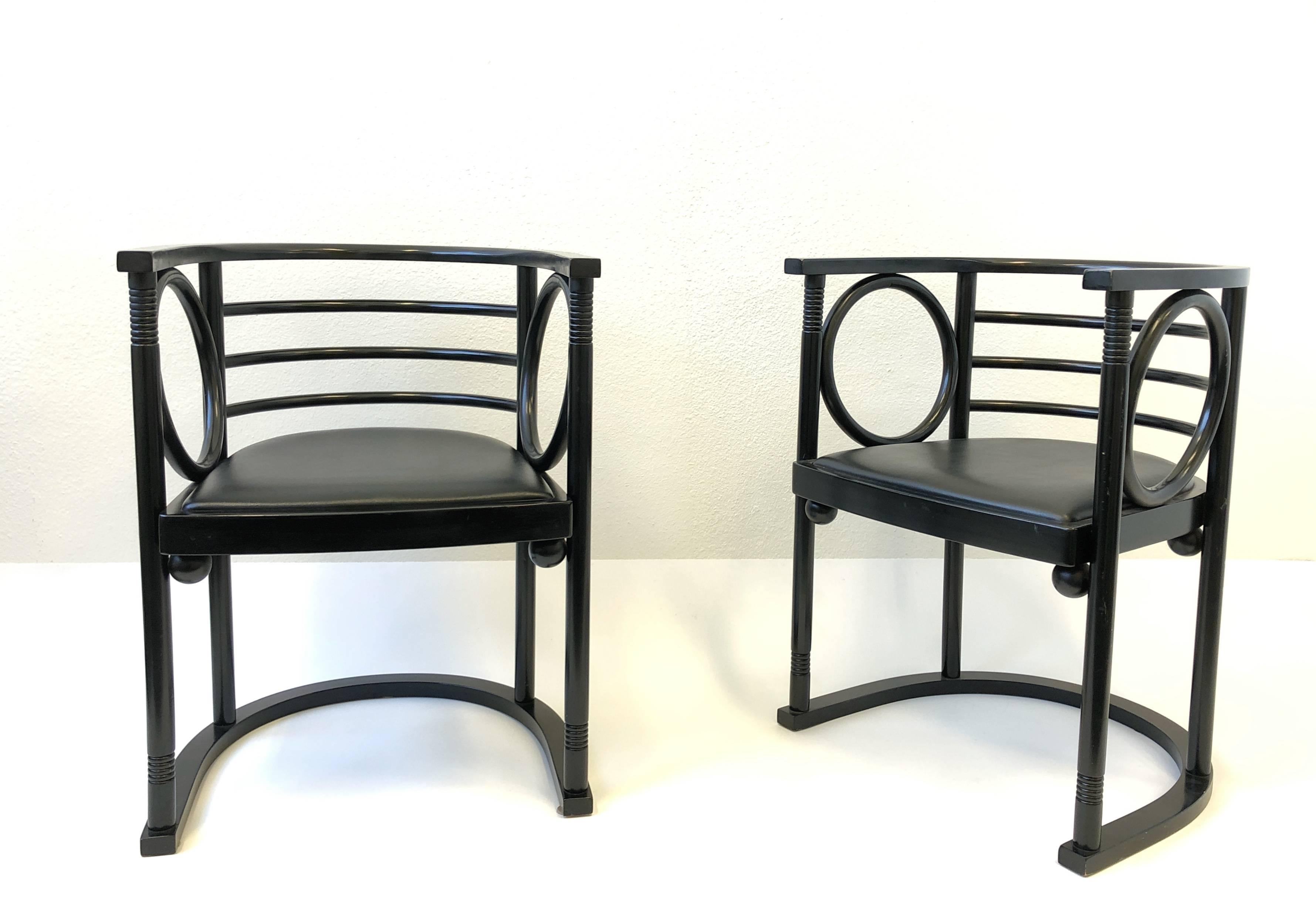 A beautiful pair of black lacquer armchairs by Josef Hoffman for Thonet.
This were originally designed in the early 1900s. This are manufactured by Thonet in the 1980s. This are in original condition the seat is covered with a black