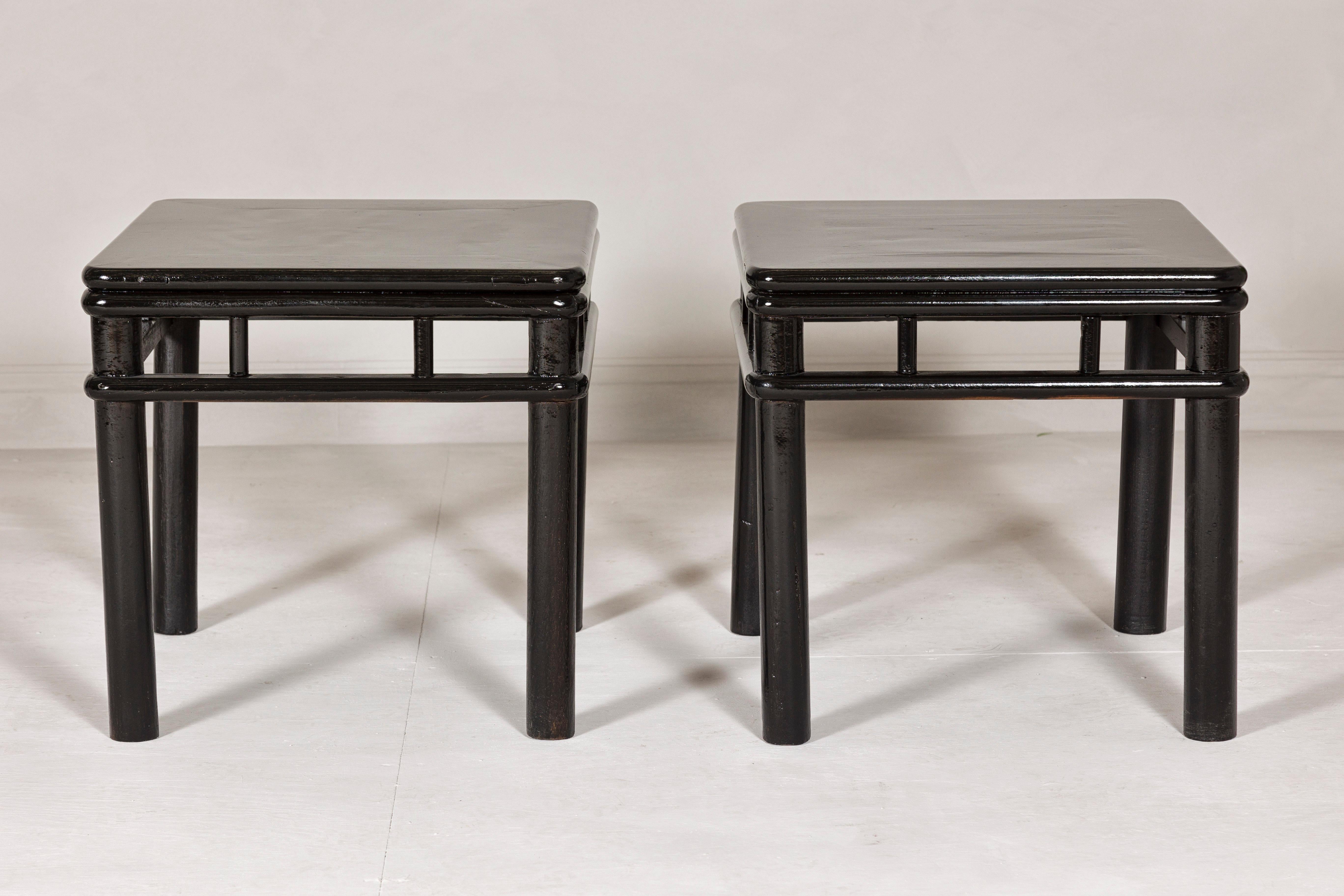 Pair of Black Lacquer Drinks Tables with Open Stretcher and Cylindrical Legs For Sale 1