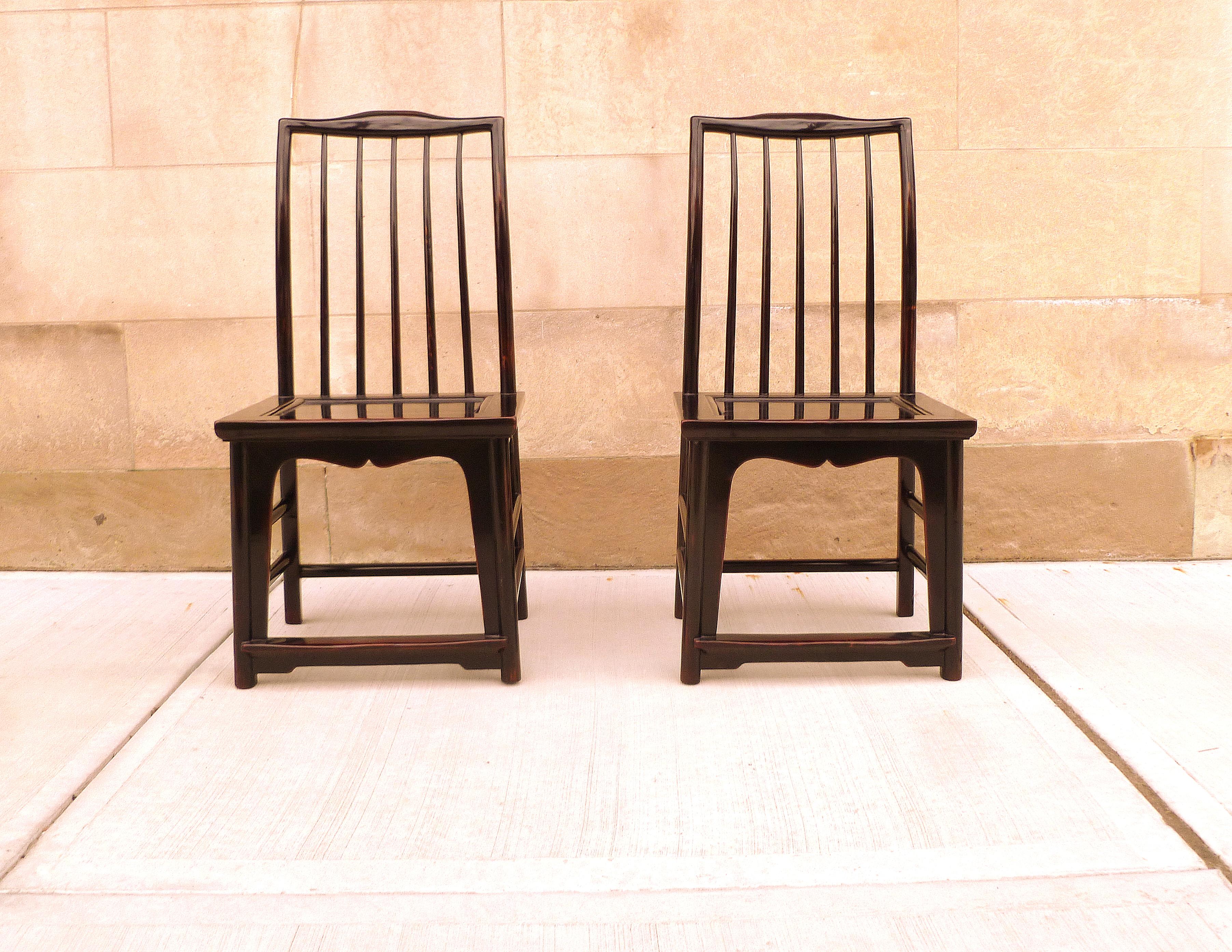 Pair of black lacquer hat chairs. Simple and elegant black lacquer hat chairs, beautiful form and lines. We carry fine quality furniture with elegant finished and has been appeared many times in 