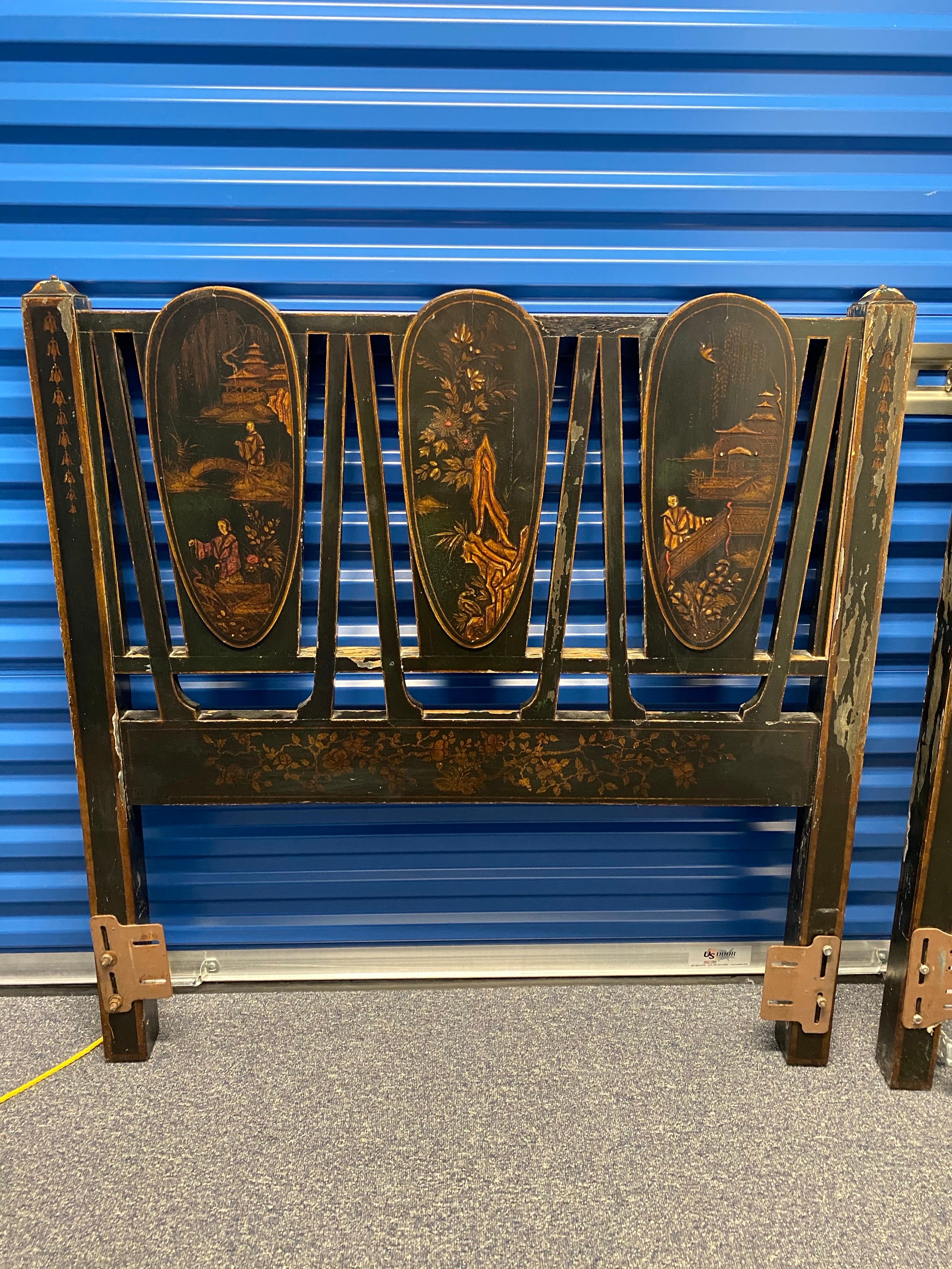 Pair of Black Lacquer Japanned with Chinoiserie Decoration Twin Headboards. 
This is a pair of antique lacquered japanned headboards showcasing chinoiserie decoration. Each frame features a black lacquered finish with hand-painted scenes of
