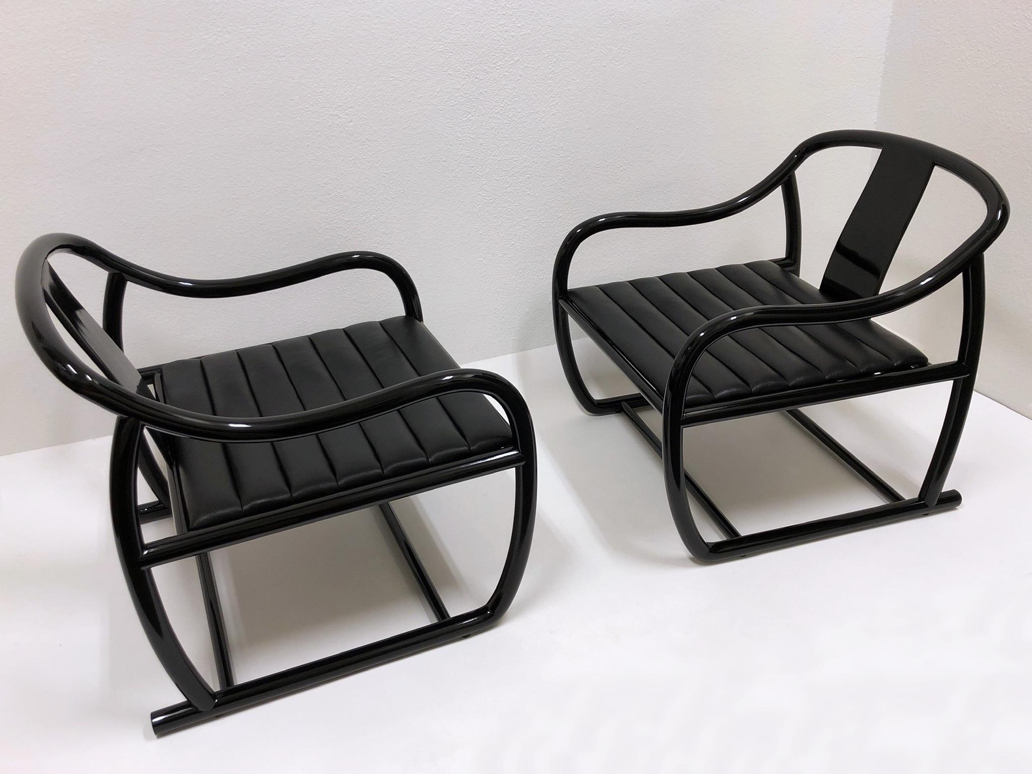 Pair of black lacquered and leather ‘L’Chine’ lounge chairs. Designed by Renowned American designer Stanley Jay Friedman in the 1970s. The chairs are in beautiful vintage condition with minor wear consistent with age.

Measurements: 28” wide,