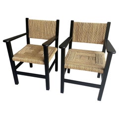 Pareja de sillones lacados en negro y de cuerda tejida, Francia, años 50