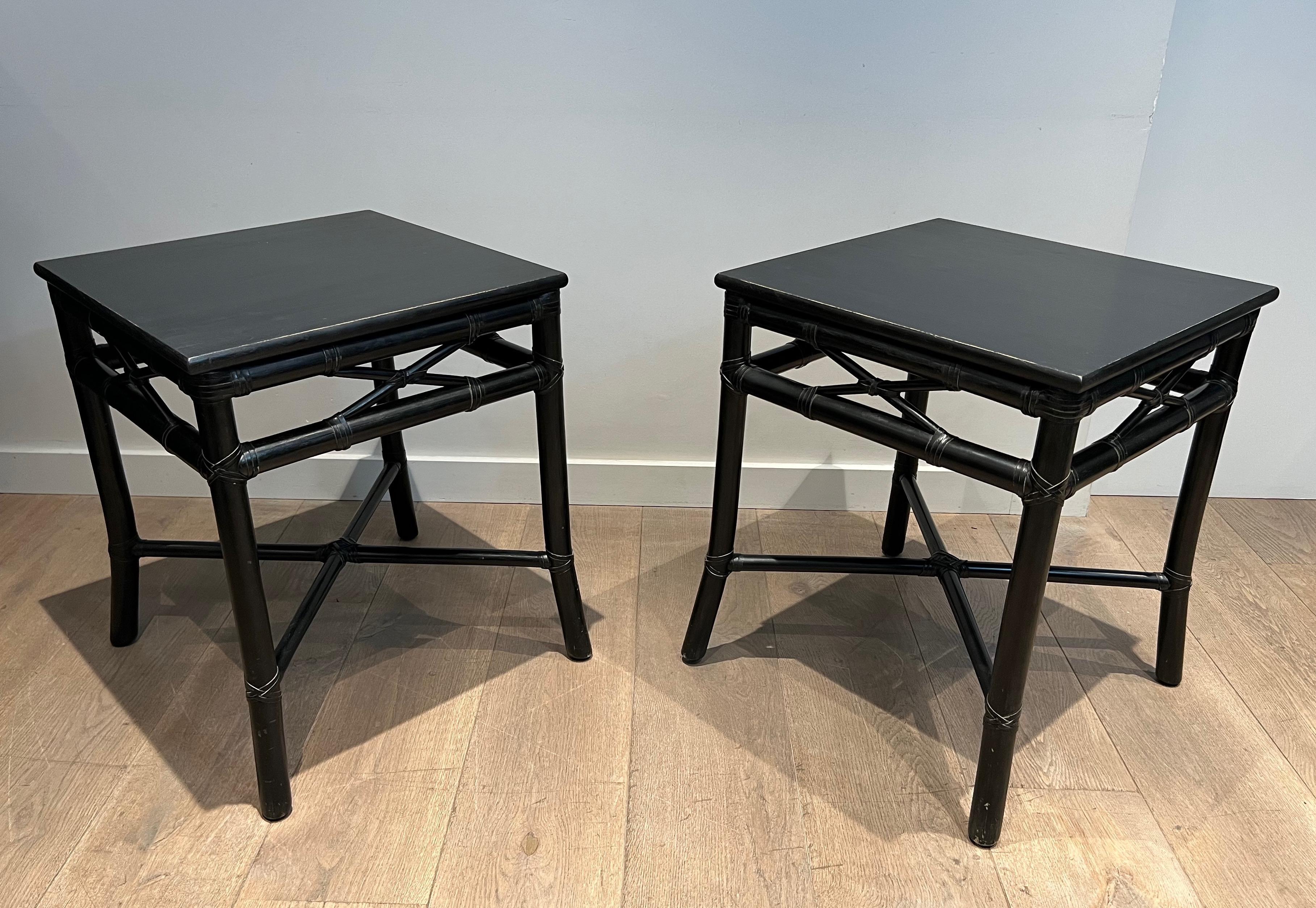 This pair of side tables is made of black lacquered faux-bamboo. This is an Italian work signed by Gasparucci. Circa 1970.