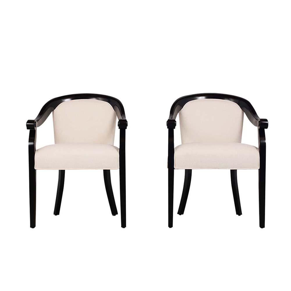 This Pair of Hickory 1960’s Modern Armchairs have been fully restored and newly stained in rich black color with a lacquered finish. The chairs feature curved backrest, scrolled armrests, and have been newly upholstered in a white pattern linen