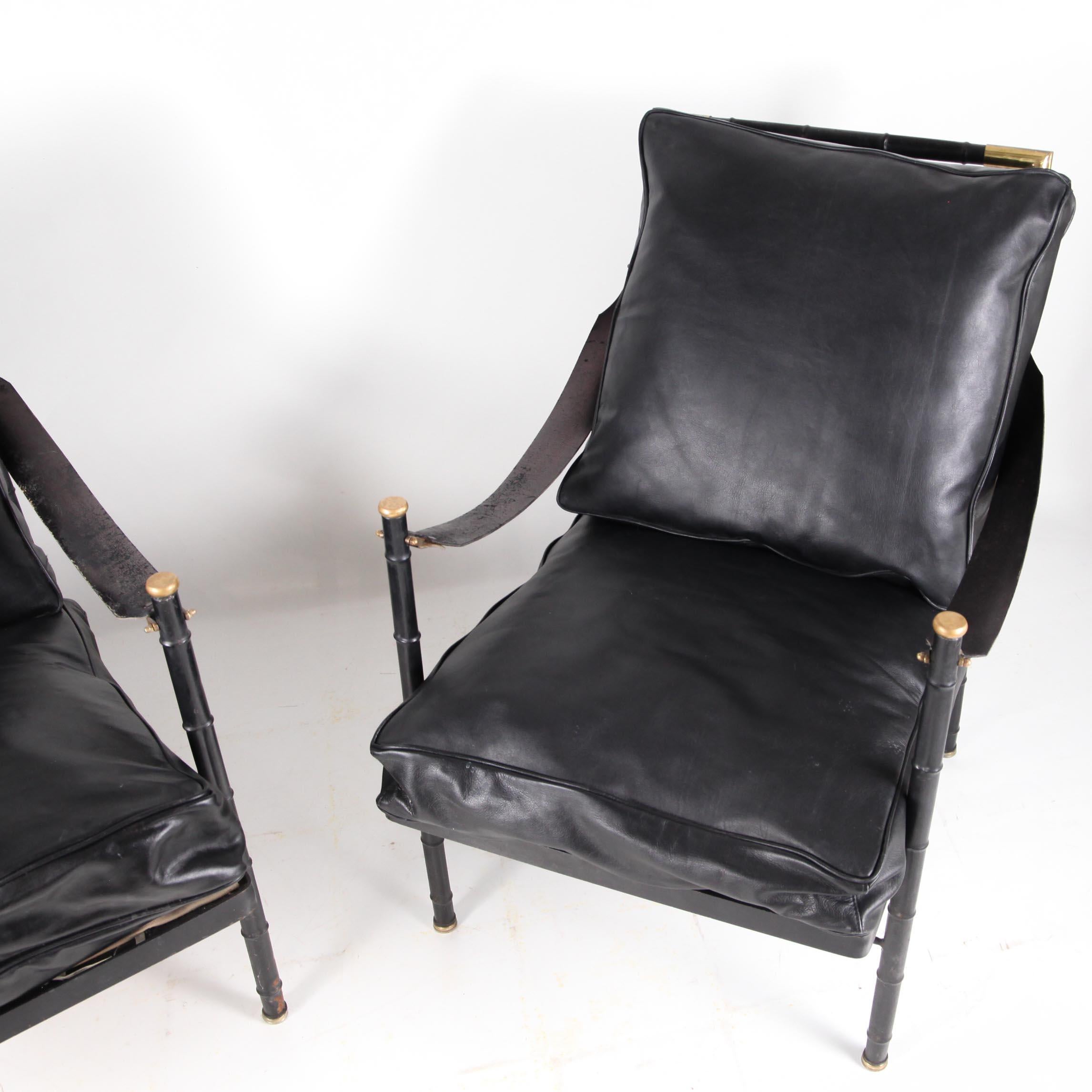 Pair of faux bamboo black lacquered metal armchairs, brass, leather cushions and armrests attributed to Jacques Adnet circa 1960