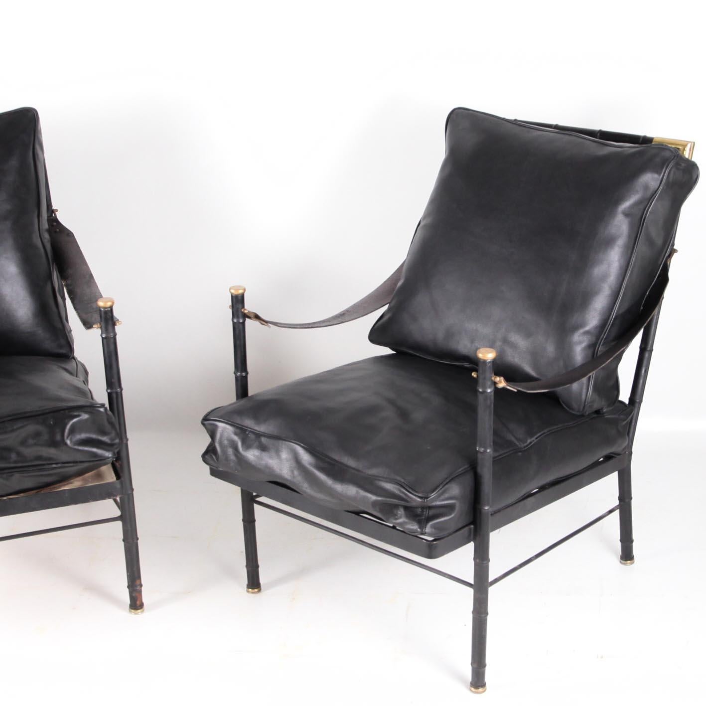 French Pair of black faux bamboo lacquered metal armchairs in brass, leather cushions 