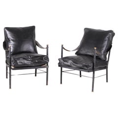 Pair of black faux bamboo lacquered metal armchairs in brass, leather cushions 