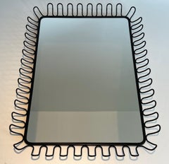 Pair of Black Lacquered Metal Mirrors. Circa 1980