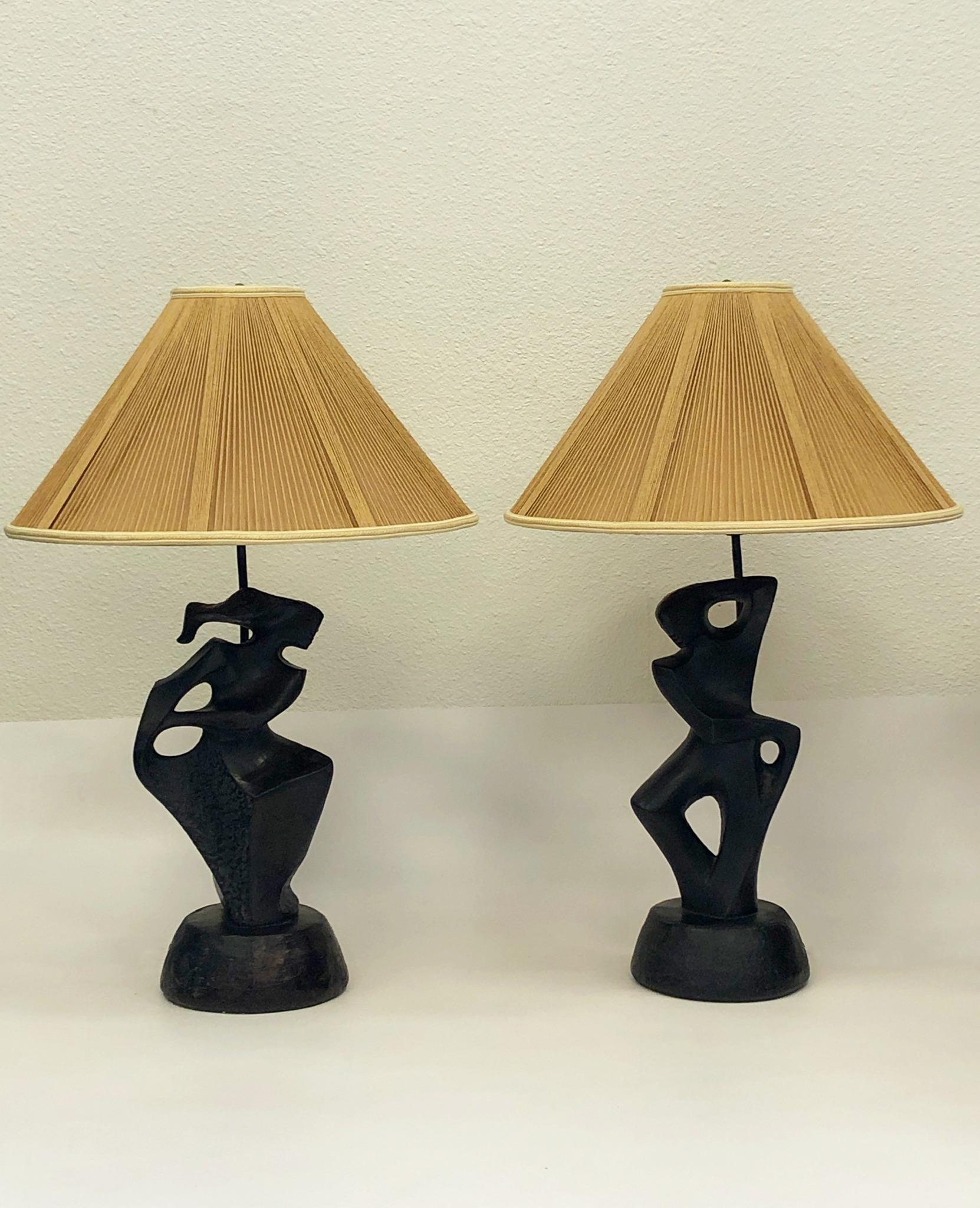 A spectacular pair of sculptural plaster male and female table lamps by Marianna von Allesch for RIMA, NY.
The lamps are cast plaster that’s black lacquered. The lamps have been newly rewired with new black cloth covered cord. The sockets are