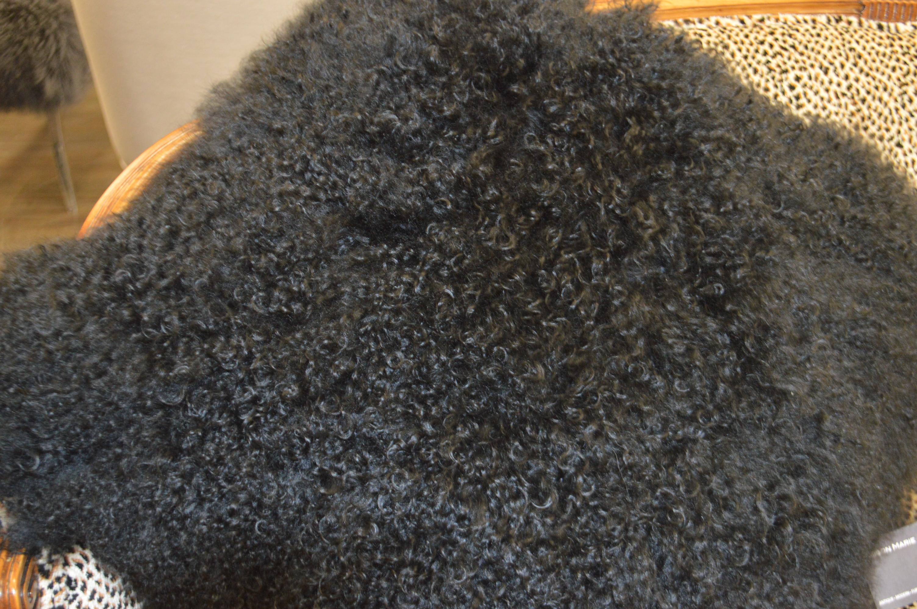 Argentine Pair of Black Large Curly Lamb's Wool Skin Made into a Pillows For Sale