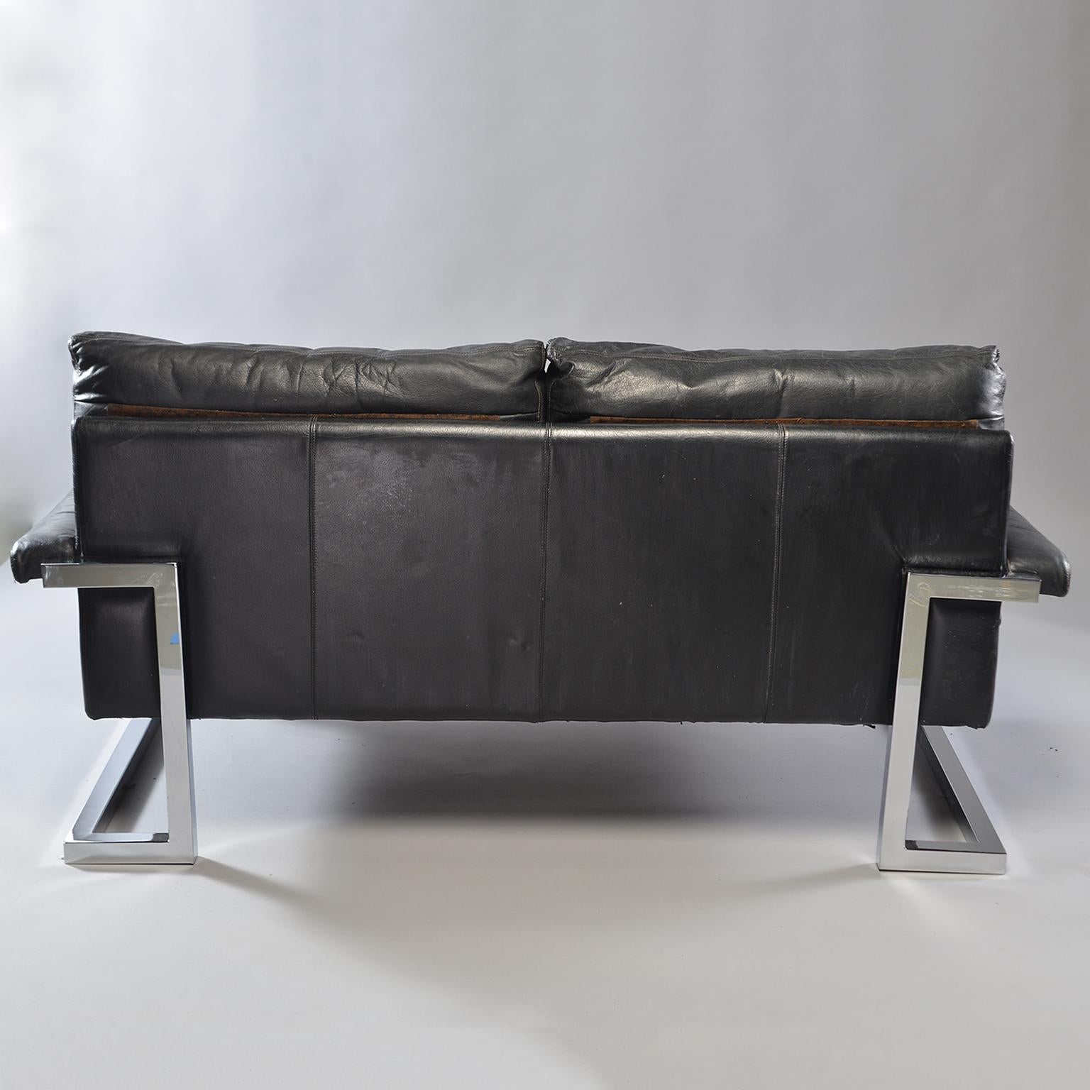 English Pair of Black Leather and Chrome Sofas by Tim Bates for Pieff & Co