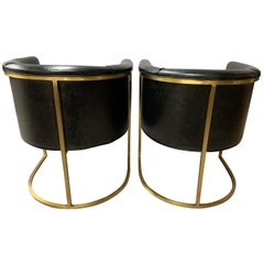 Pair of Black Leather and Gold Steel Rounded Barrel Back Chairs