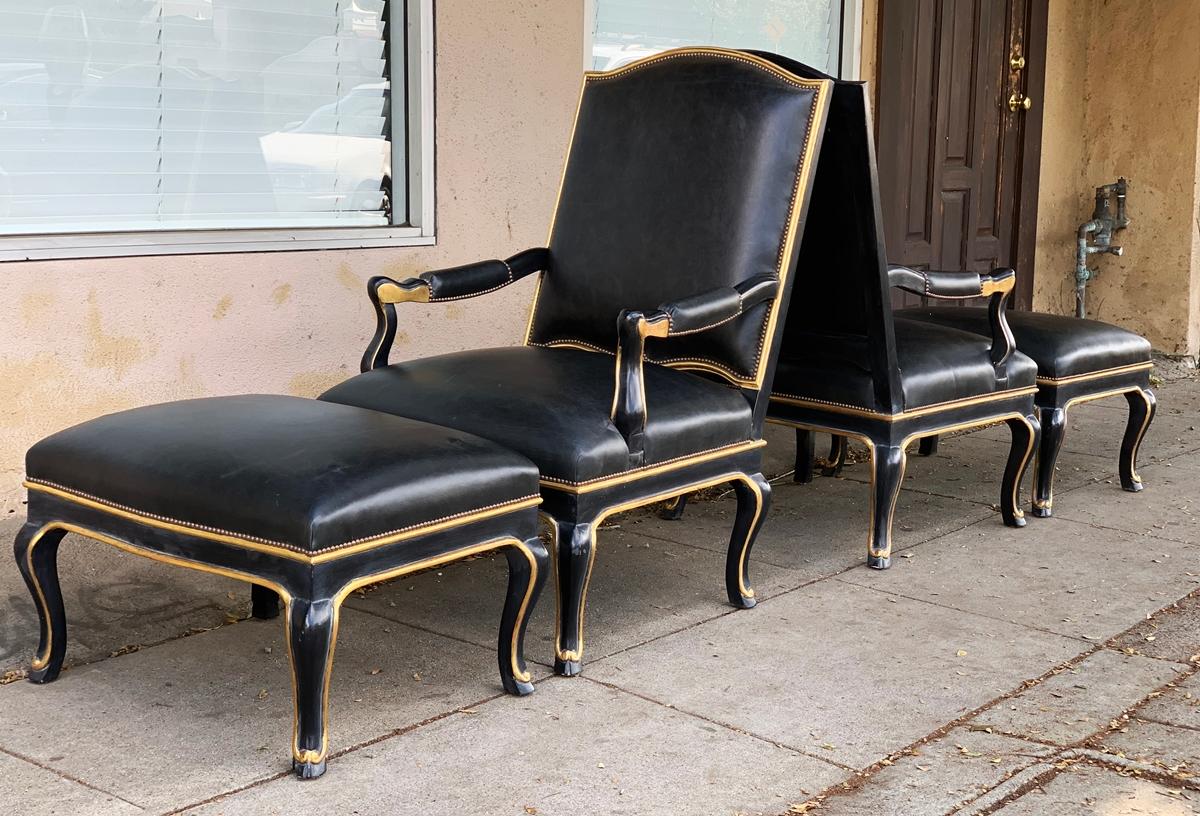 Mid-Century Modern Pair of Black Leather Armchairs and Ottomans, circa 1960s