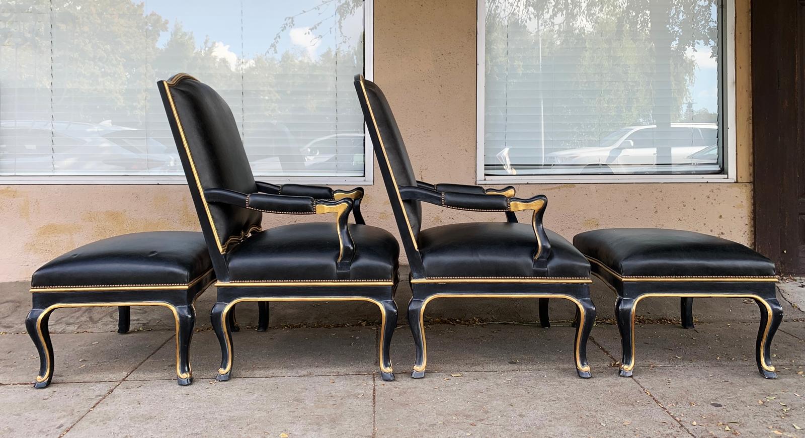 Pair of Black Leather Armchairs and Ottomans, circa 1960s 1