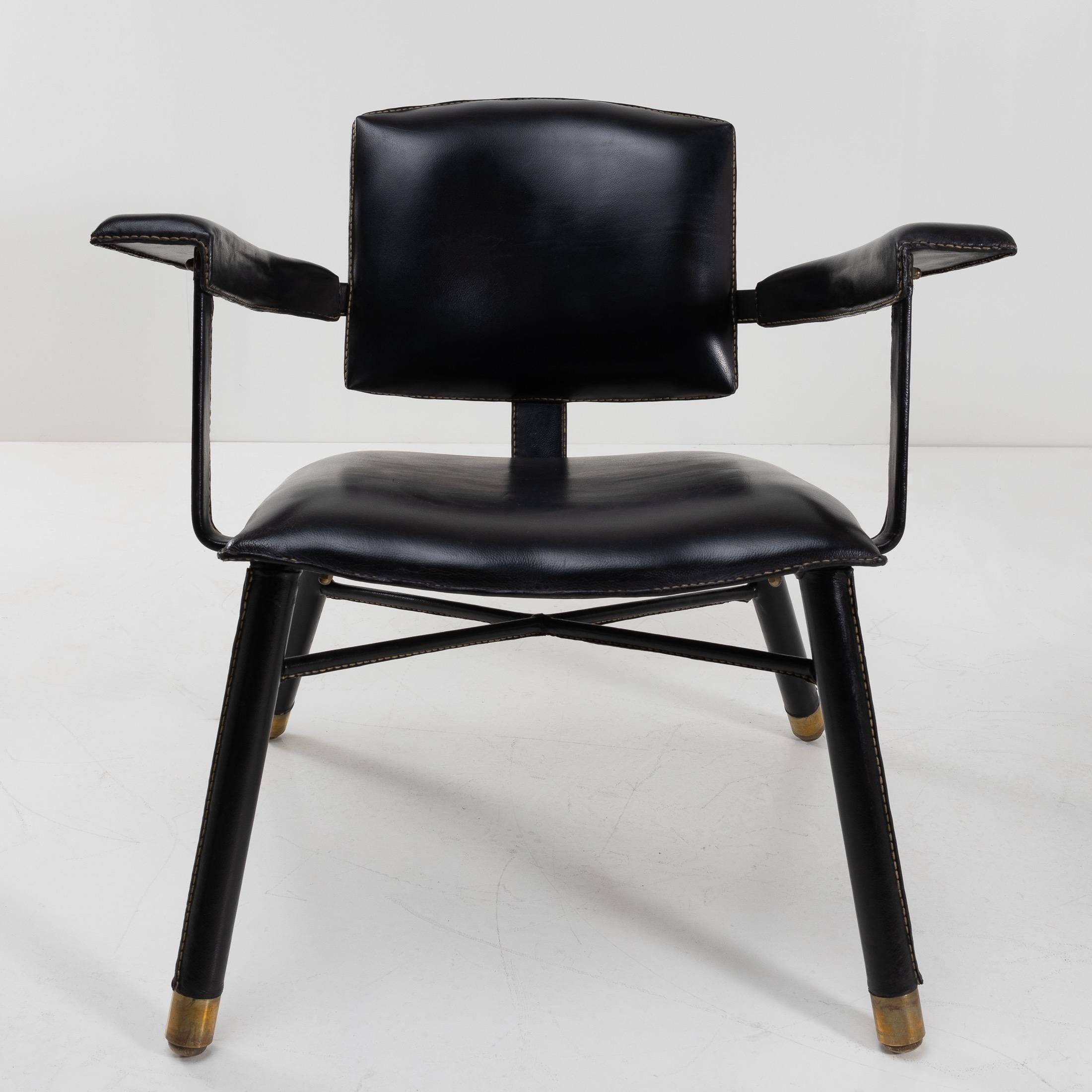 Brass Pair of Black Leather Armchairs Called “Chauffeuse” by Jacques Adnet