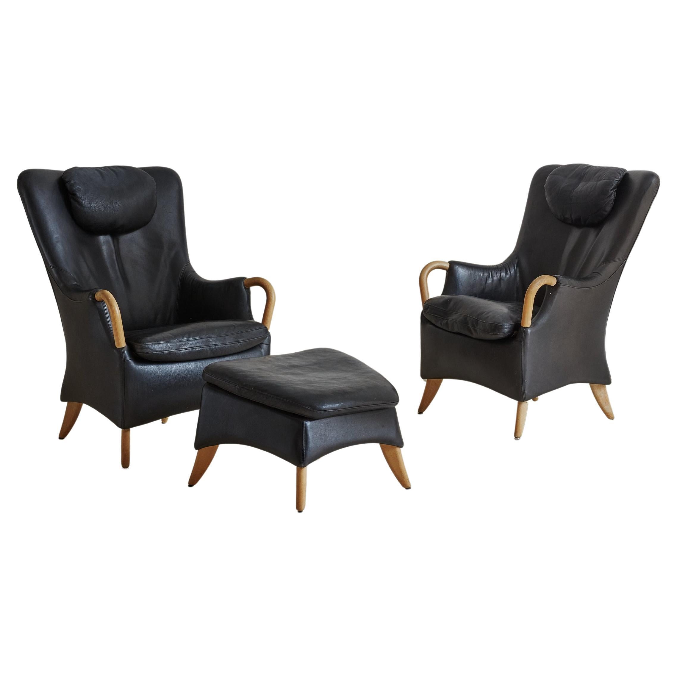 Pair of Black Leather Armchairs with Footstool by Both Søren Nissen & Ebbe Gehl For Sale