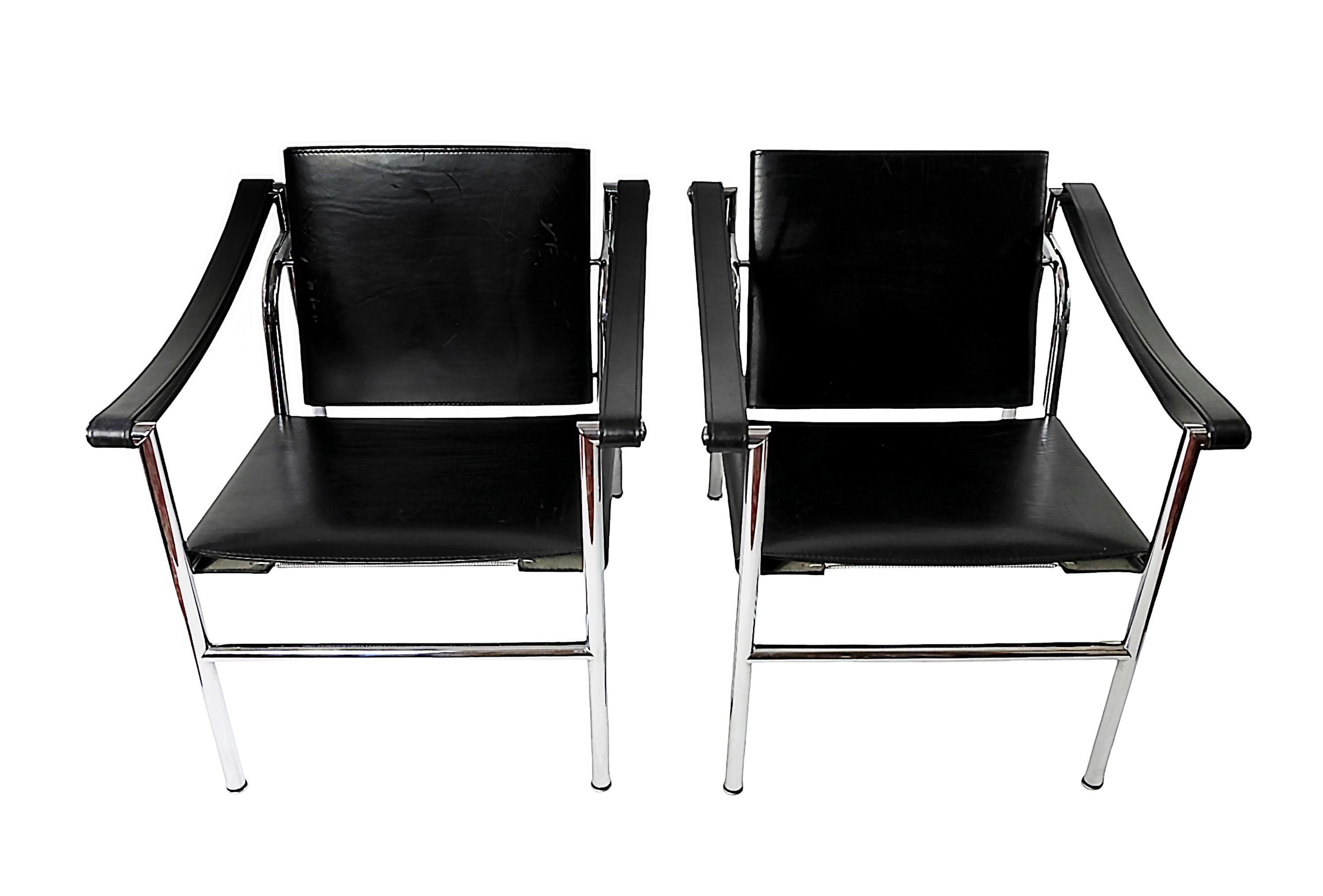 Pair of vintage LC1 black leather chairs designed by Le Corbusier circa 1928's and manufactured by Cassina in 1990's.
Engraved serial umbers, Le Corbusier signature and Cassina mark.
Good original vintage condition.

 

 
