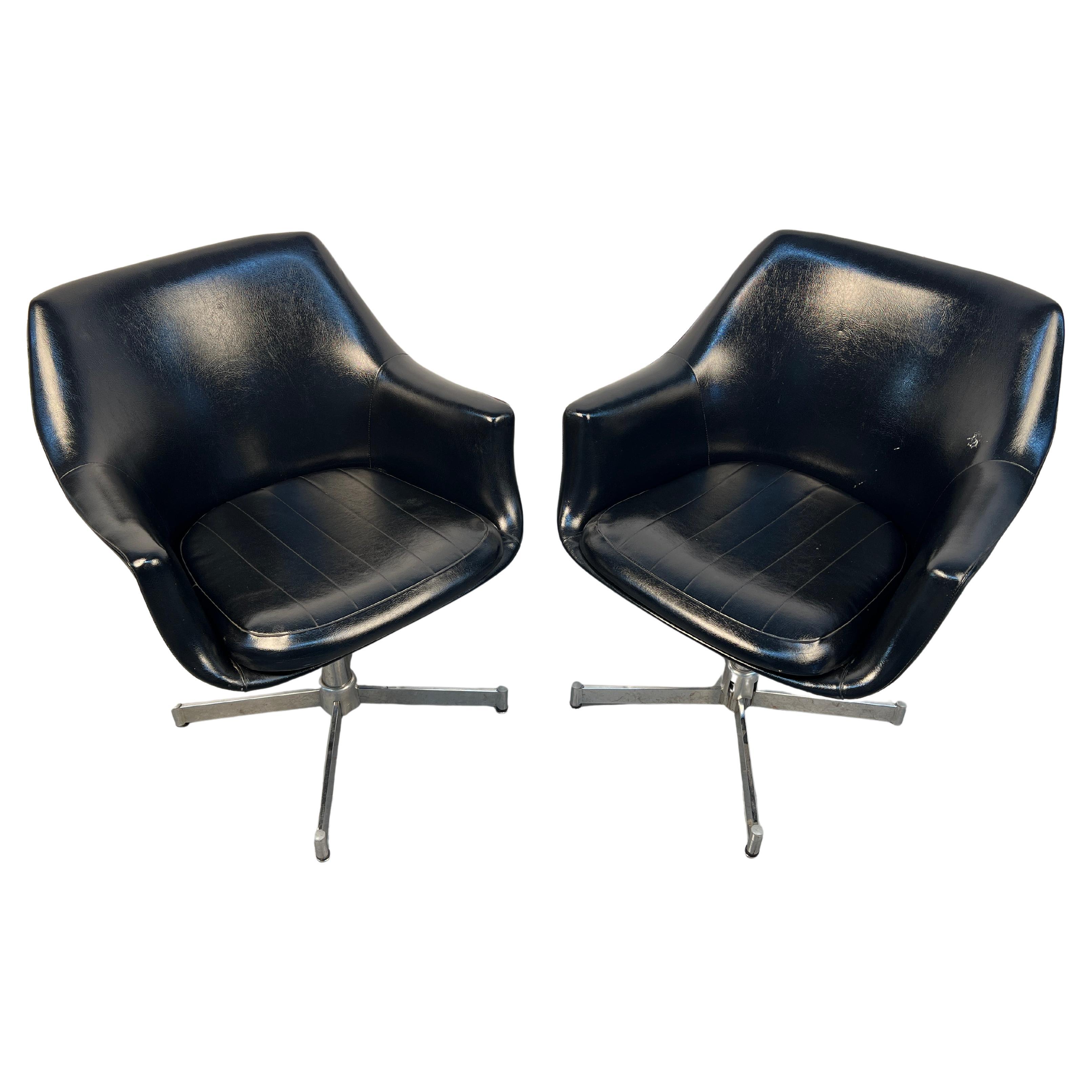 Pair of Black Leather Mid-Century Modern Swivel Chairs