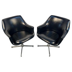 Pair of Black Leather Mid-Century Modern Swivel Chairs