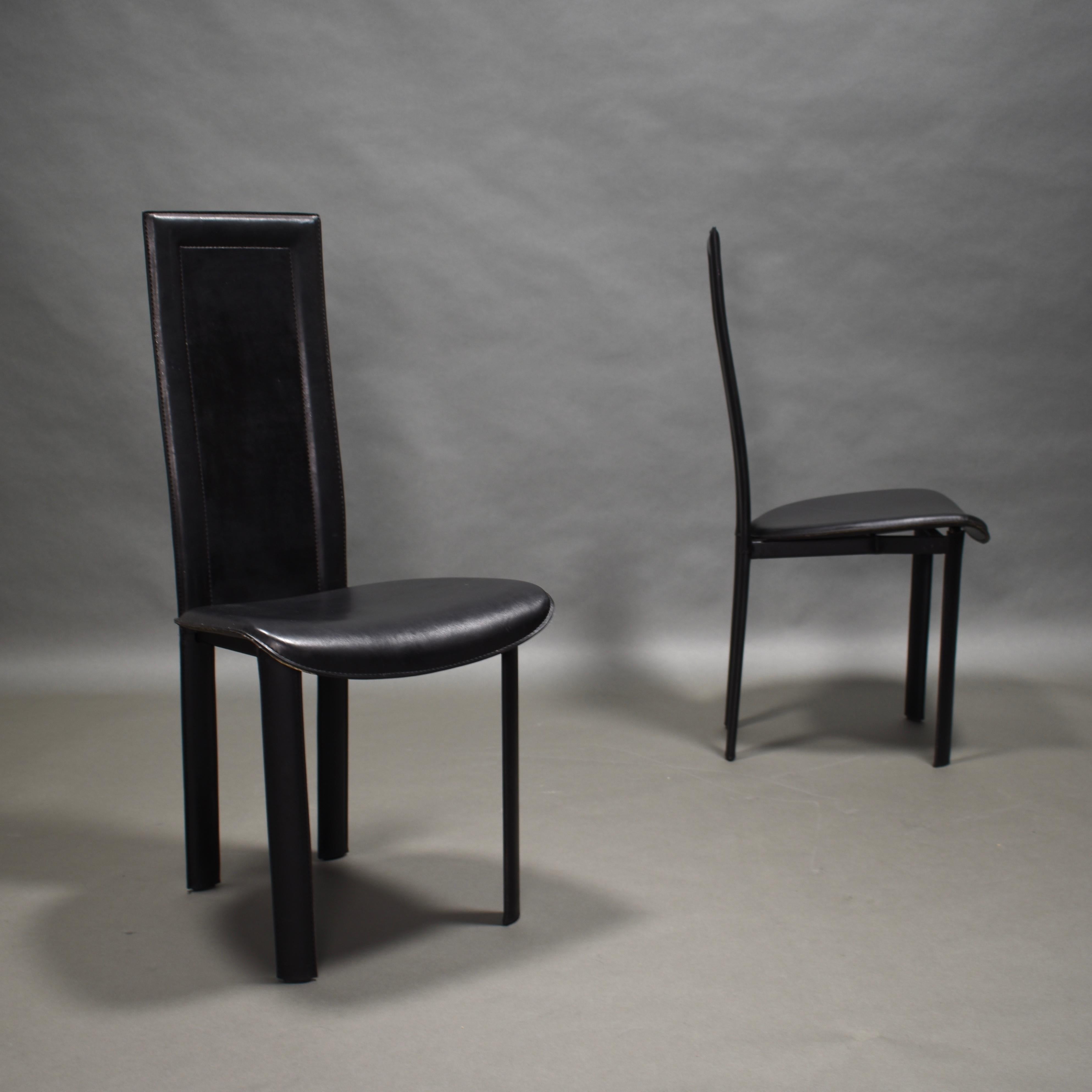 Pair of QUIA ‘Elena B’ Italian black leather high back dining chairs, 1970-1980.

Designer: Unknown

Manufacturer: Quia

Country: Italy

Model: Elena B

Material: black leather

Design period: circa 1970-1980

Date of manufacturing: