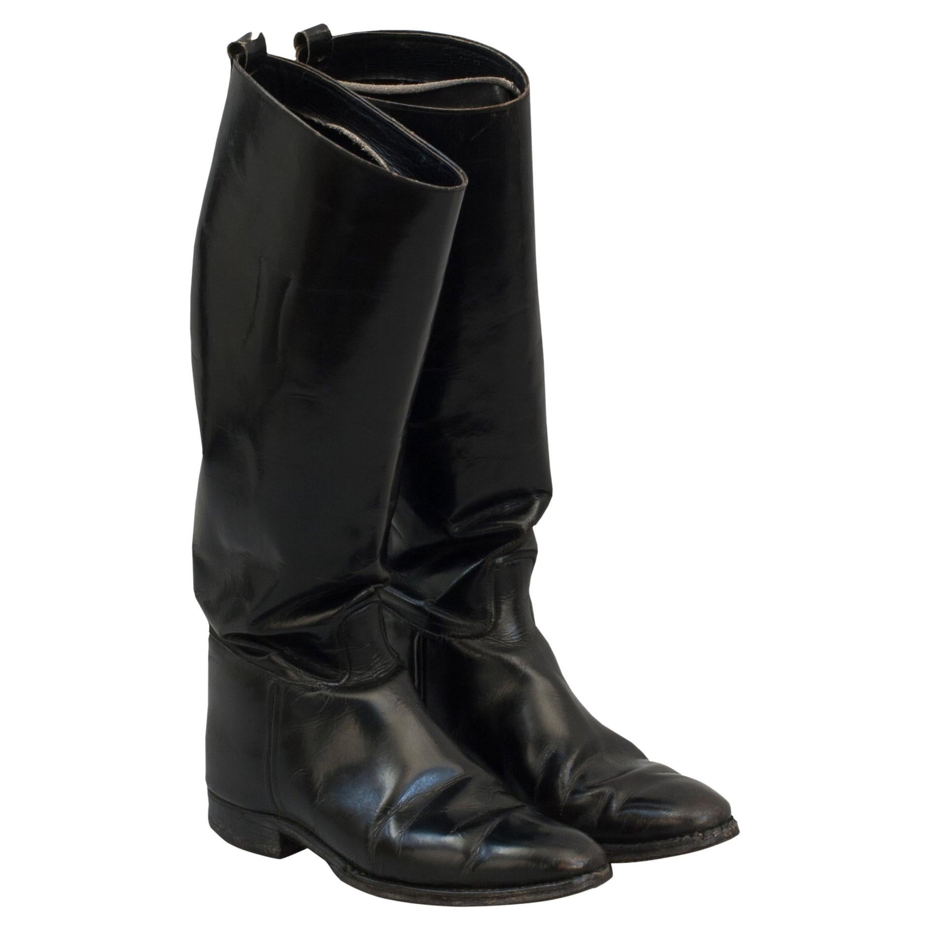 Pair Of Black Leather Riding Boots