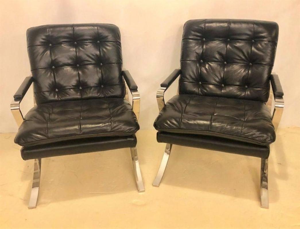 Pair of black leather tufted and chrome X-base cigar chairs.