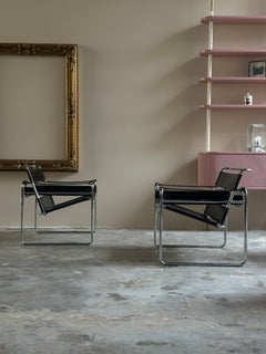 Pair of black leather Wassily armchairs by Marcel Breuer for Gavina/Kiga S.p.A.