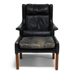 Pair of Black Leather Wingback Chairs and Ottoman by Gerhard Berg, 1965